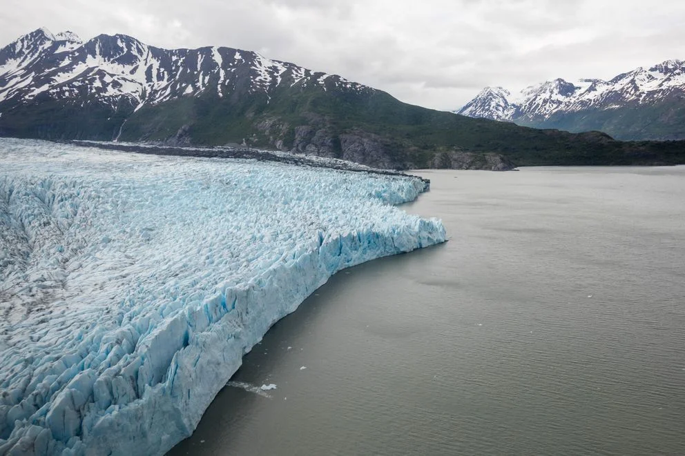 Colony Glacier as seen through the window of an Alaska Army National Guard UH-60 Black Hawk on Saturday, June 16, 2018 (Loren Holmes/Anchorage Daily News)