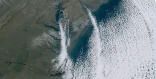 Cold air flowing over warm water generating "clouds streets"