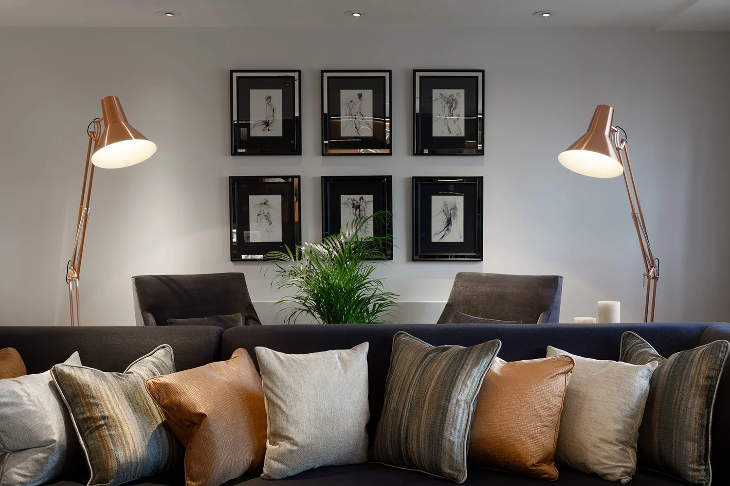 We were approached by our clients to re design their 3 bedroom London retreat into an apartment full of character and edge. It being their second home they were eager to create a unique and bold interior using a variety of materials. The interior is therefore distinguished by beautiful bespoke furniture and an emphasis on the use of natural materials such as brass, copper, wood and horn in both the bedroom, study and living areas. To elevate the apartment we chose a striking colour palette throughout the interior which is stunningly complemented by the clients’ extensive art collection. The master bedroom is dipped in an array of turquoise and blue whilst the guest bedroom is a calm purple and pearl oasis. The study and living area on the other hand are a celebration of natural materials - the study area being a gorgeous mix of brass, dark wood and blues and the living area a fusion of natural copper, leather and navy textures. The result is a wonderfully calm yet striking design. 