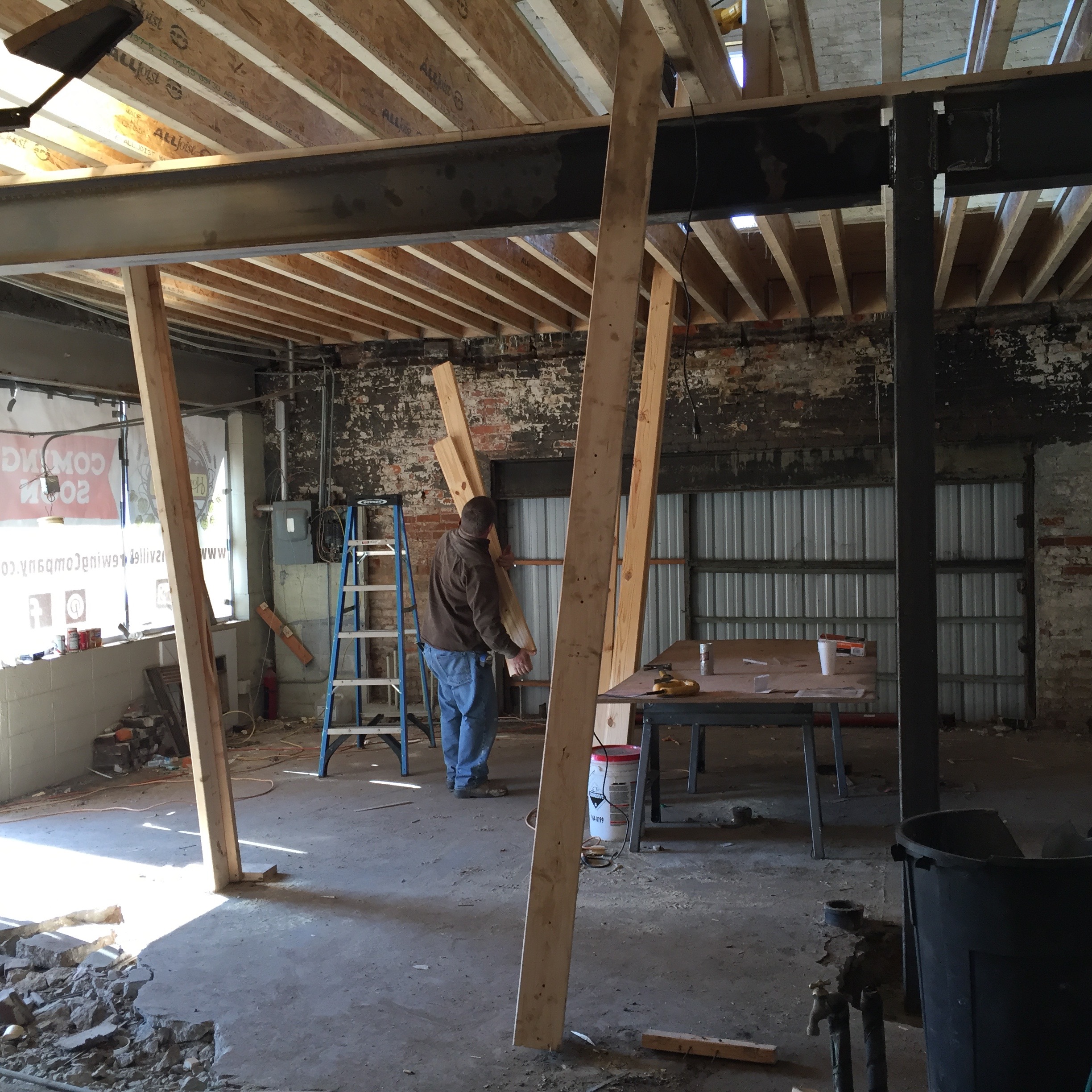  With the steel beam in place, the floor joists can be put into place. 