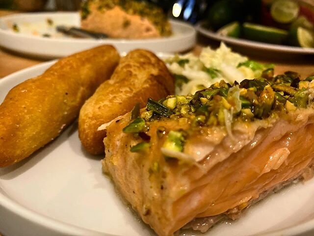 Dinner is served! I made pistachio crusted salmon inspired by the inimitable @blacklikewho but I tried 😊 🐠. Accompanied by festival, a Jamaica 🇯🇲 side, and Napa cabbage slaw. 👩🏾&zwj;🍳 😘