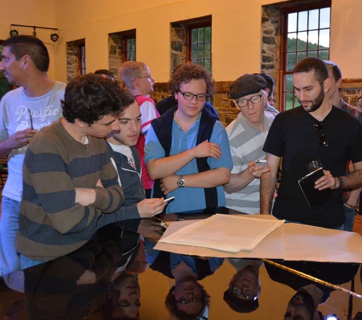 Exploring the manuscript to Luciano Berio's Sequenza X. Left to right: Lucas Lipari-Mayer, Jacob Rosenberg, Nicolás Bejarano, Étienne Massicotte, Ethan Marks