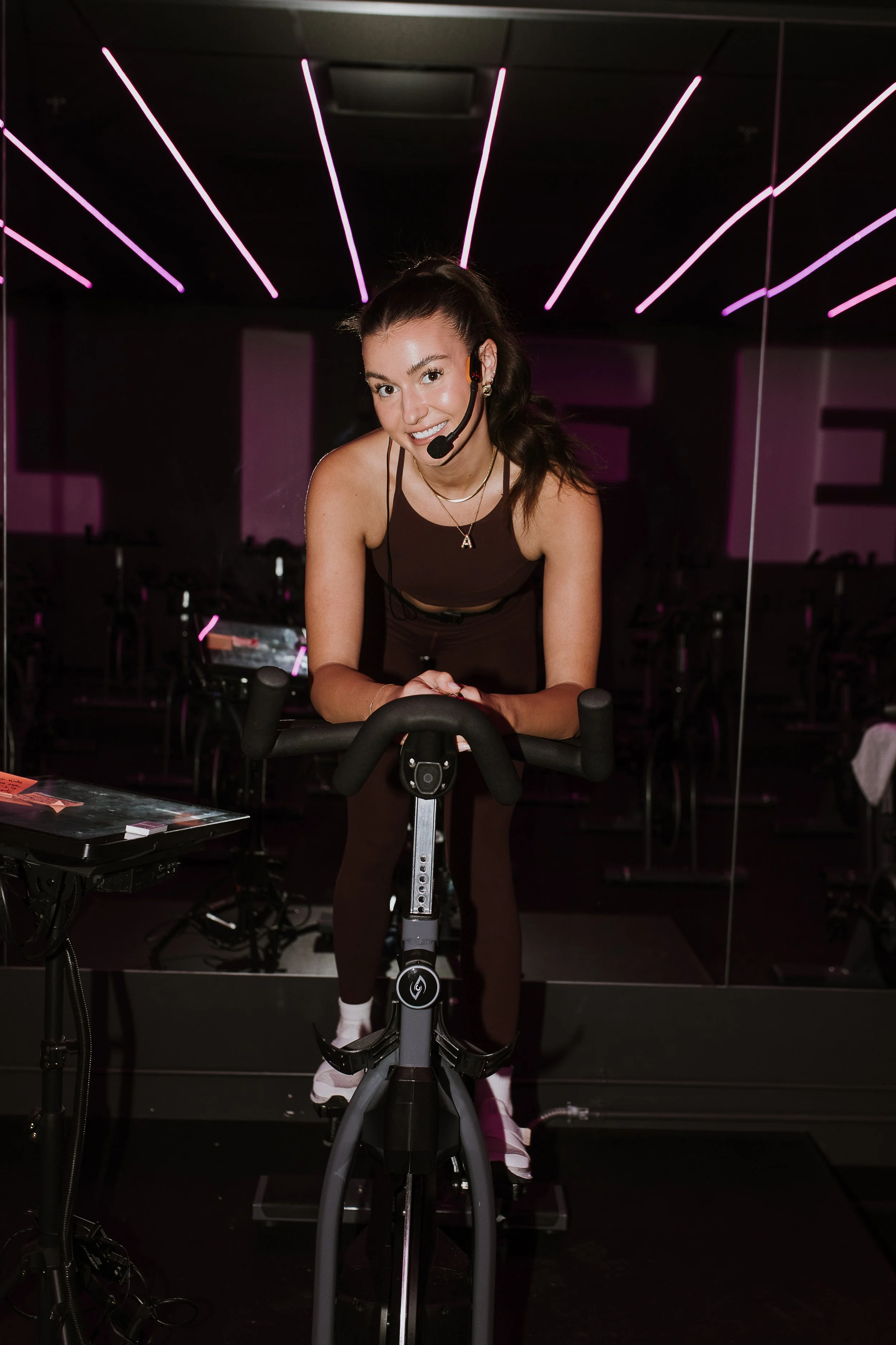 Spin Instructor Alicia on a pin Bike