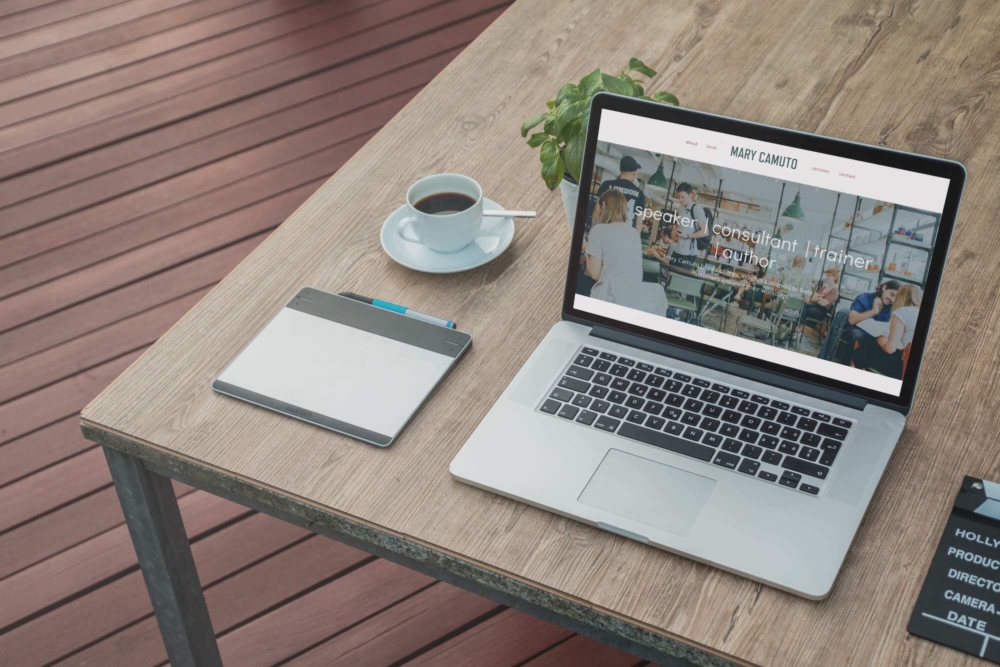 Macbook+flatlay+mockup+showing+Mary+Camuto+website+on+a+wooden+table+with+morning+coffee+and+plant.jpg