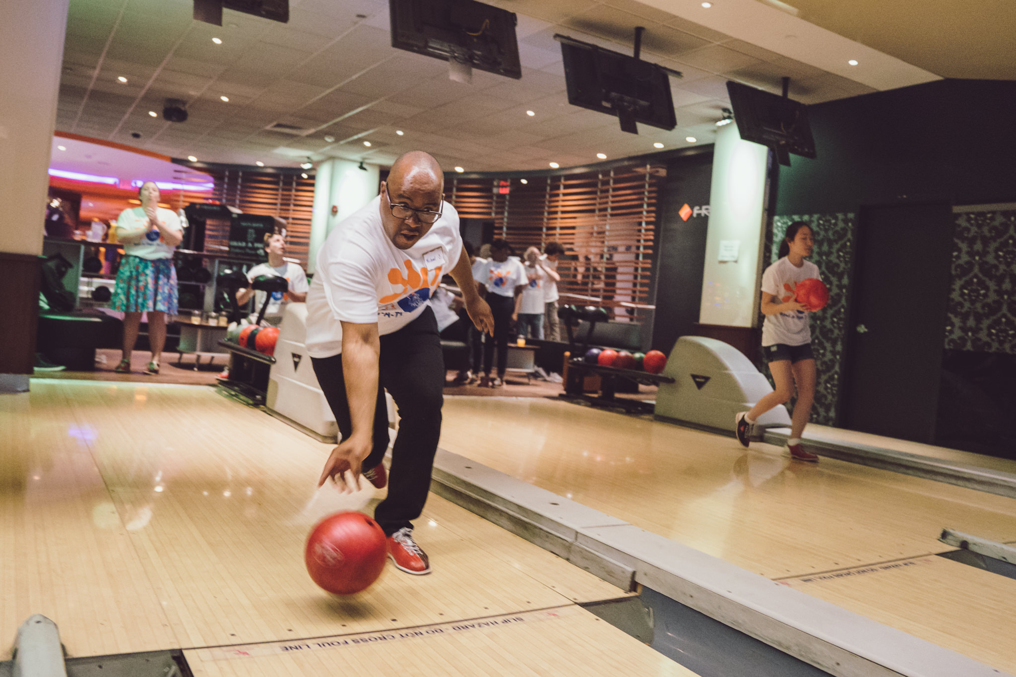  A bowler and fundraiser for All Starts Project participates in their annual Bowl-A-Thon. Photo by Daniel Lee. 