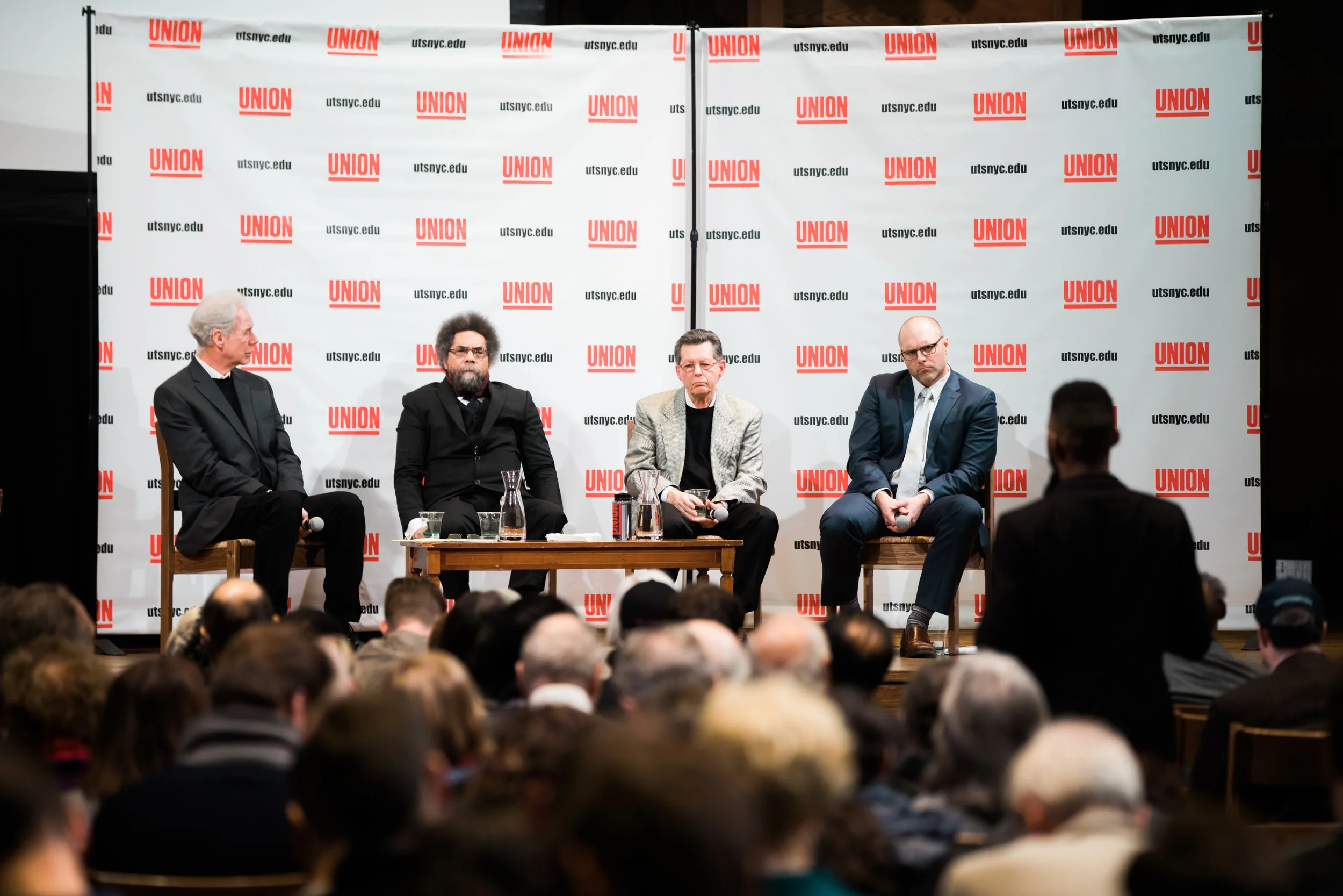 A panel of speakers for Union Theological Seminary's Faith in America series listens to a question from the audience. Photo by Daniel Lee.