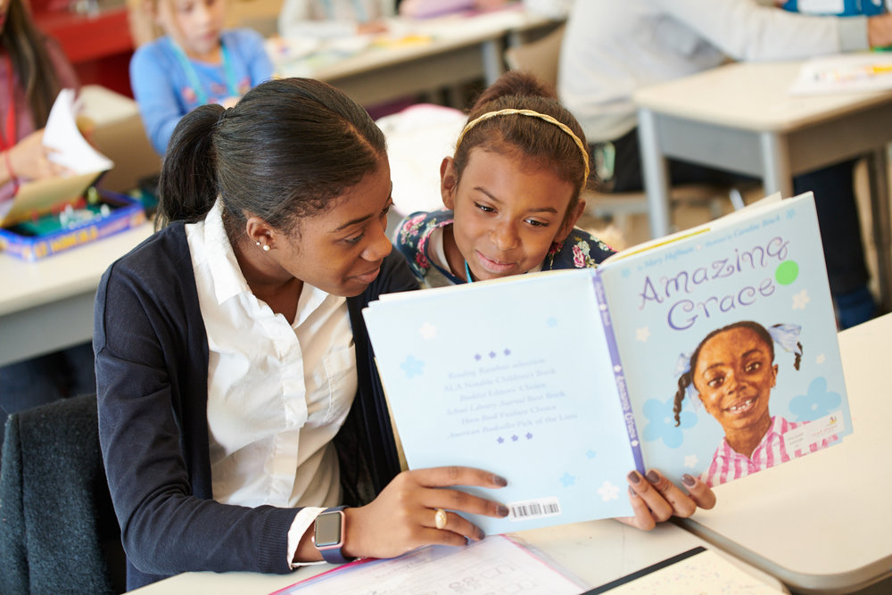  Showcasing lunchtime reading program and relationship between adult volunteers and students for Read Ahead's online &amp; print fundraising campaign. Photo by Daniel Lee. 