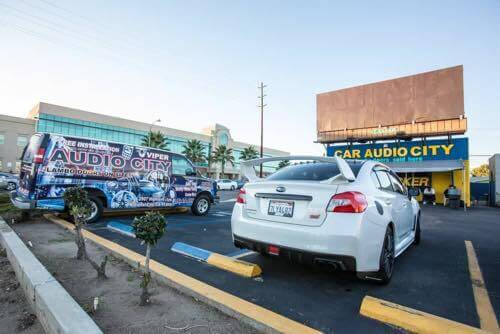 Our Car Audio City Van in Front of Our Shop