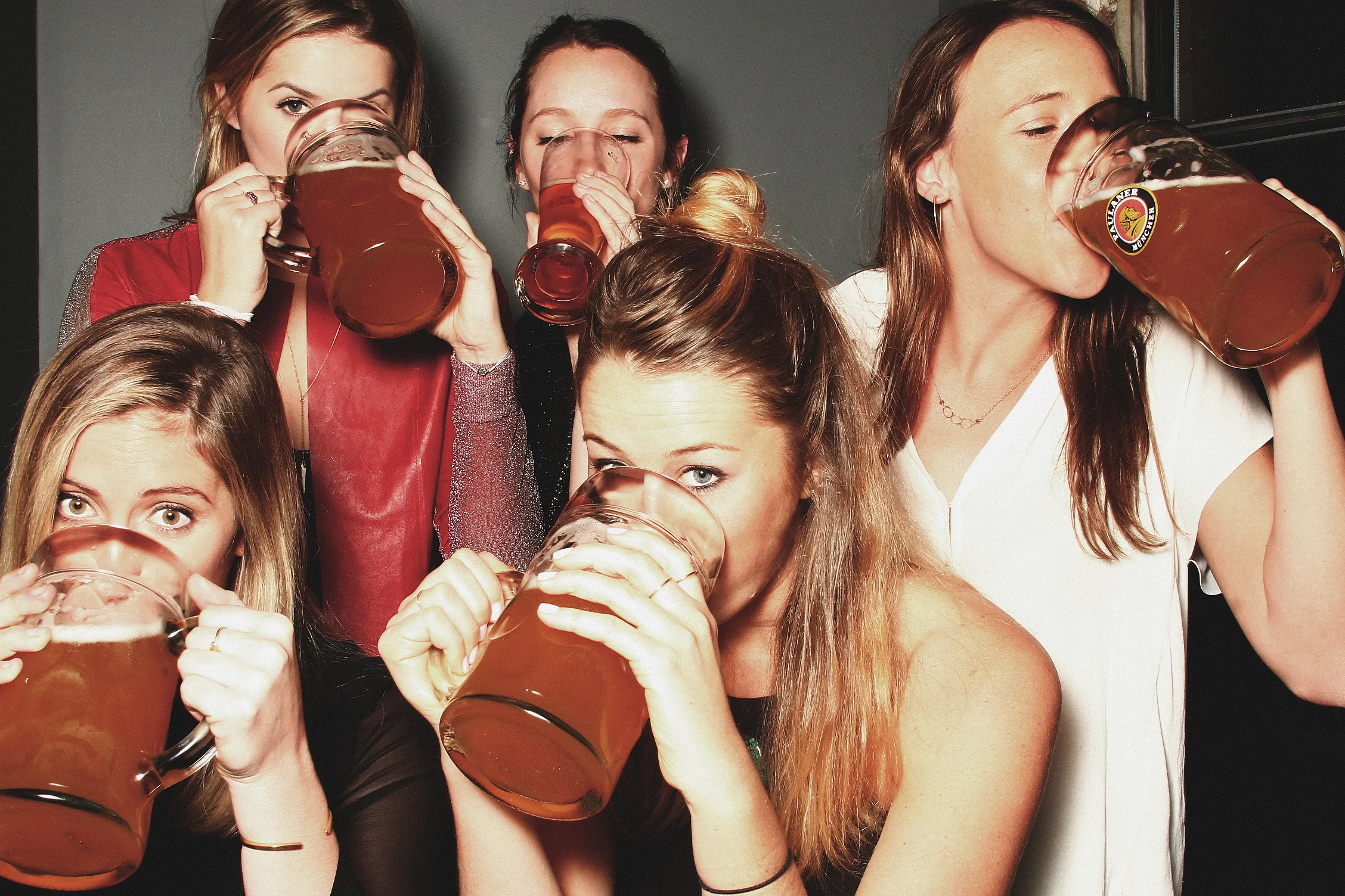  Girls drinking beer from liters. 