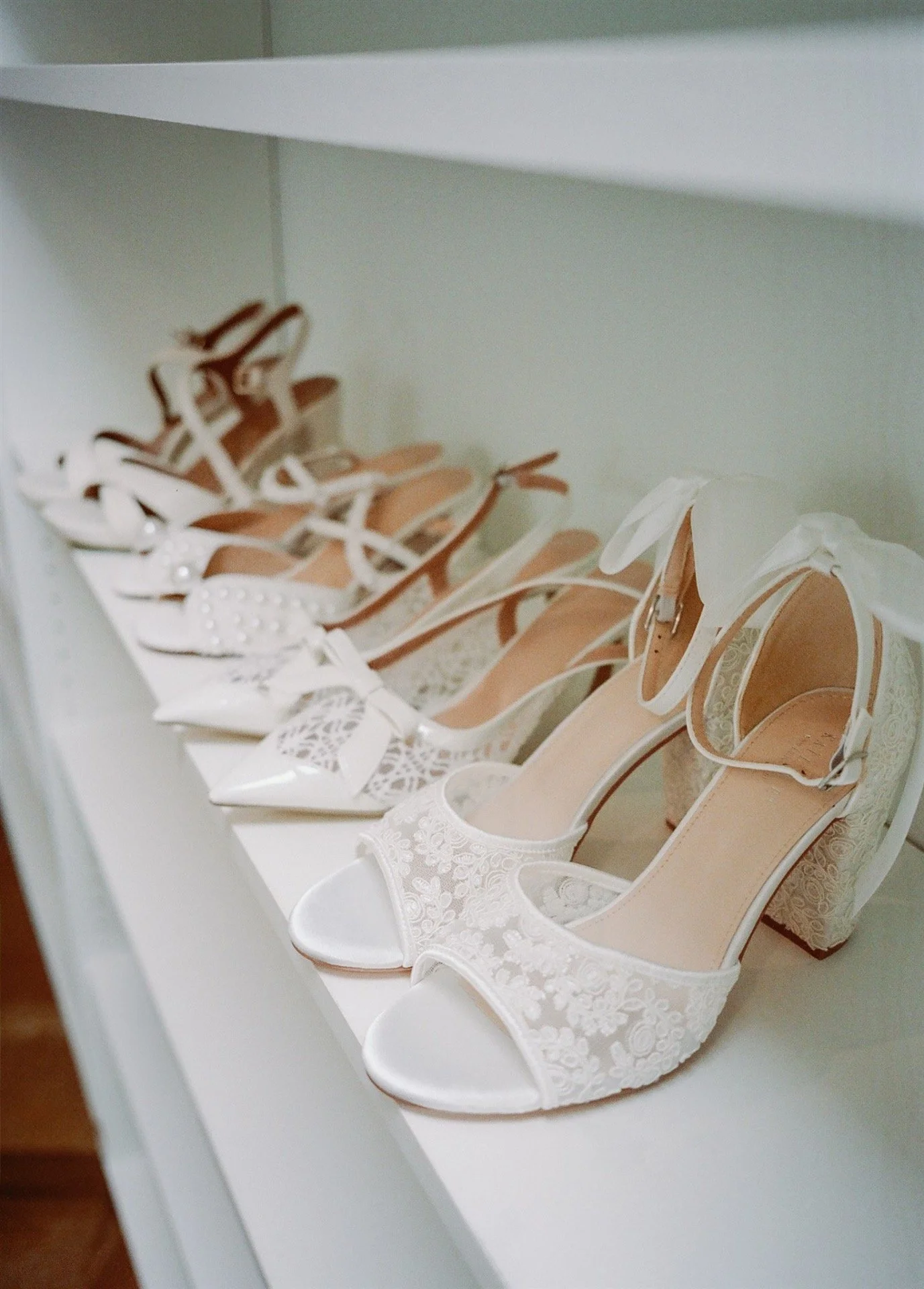 Your wedding shoes need to do more than look pretty. 

Yes, we love a gorgeous pair of heels, but your shoes also need to survive photos, walking, standing, dancing, and maybe a little happy crying on the dance floor.

Choose a pair that fits your st