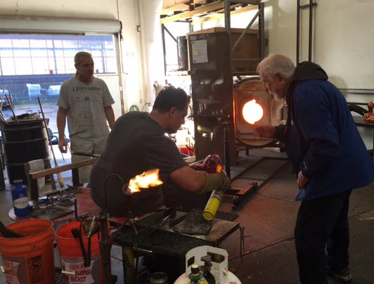 Wayne working on the Night in Tunisia "genie" bottle with Guido Gerlitz and Mark at Effetto Glassworks.