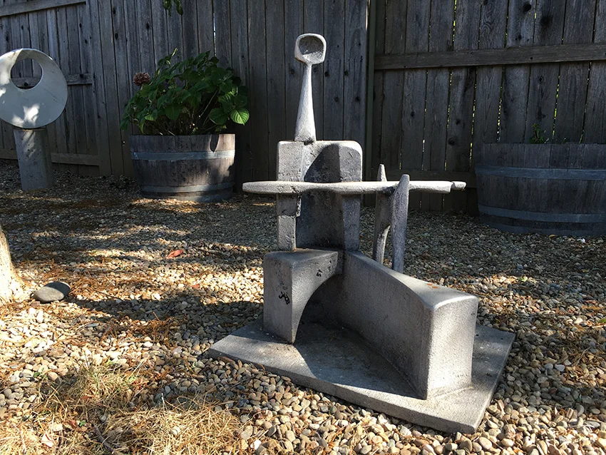 My glassblower sculpture that was cast from a Styrofoam pattern like patterns made for the Antigua molds. The glassblower's body was cast from half of a bottle mold.