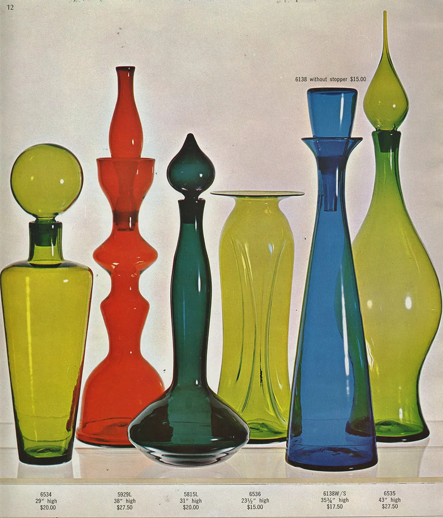 Photo from Blenko Glass Company's 1965 catalog, showing three of my large scale, nonfunctional architectural pieces. The second from the left in tangerine is my 5929 "Chess Piece," 38" high, designed in 1959. The charcoal gray piece 5815L is a design I created in 1958, and the cobalt blue is another of my architectural pieces issued in 1961. In the numbering system that I pioneered at Blenko the first two numbers are the year and the next number indicates the sequence in which I developed the design.