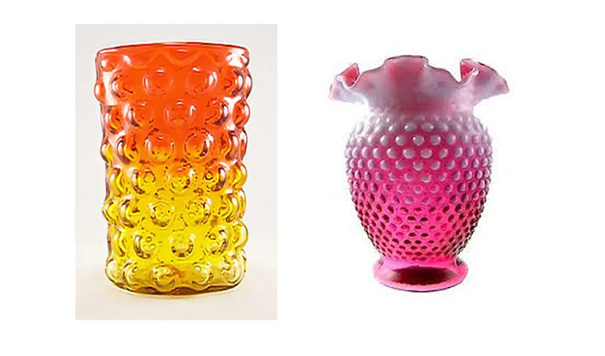 The Vintage, or Cornhusker vase in tequilla sunset that I designed at Blenko in 1960. On the right, a hobnail pattern in cranberry over opal is vintage and by Fenton Glass.