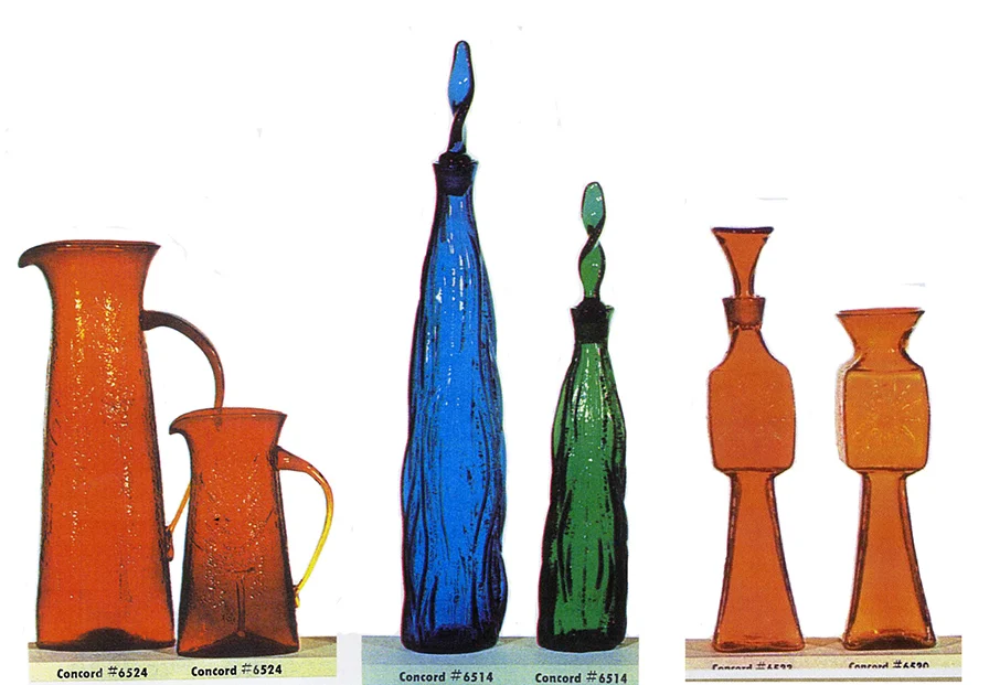 From left, two tangerine pitchers, a blue and a green decanter, and a tangerine decanter and vase, all made in the lost foam process that I created.