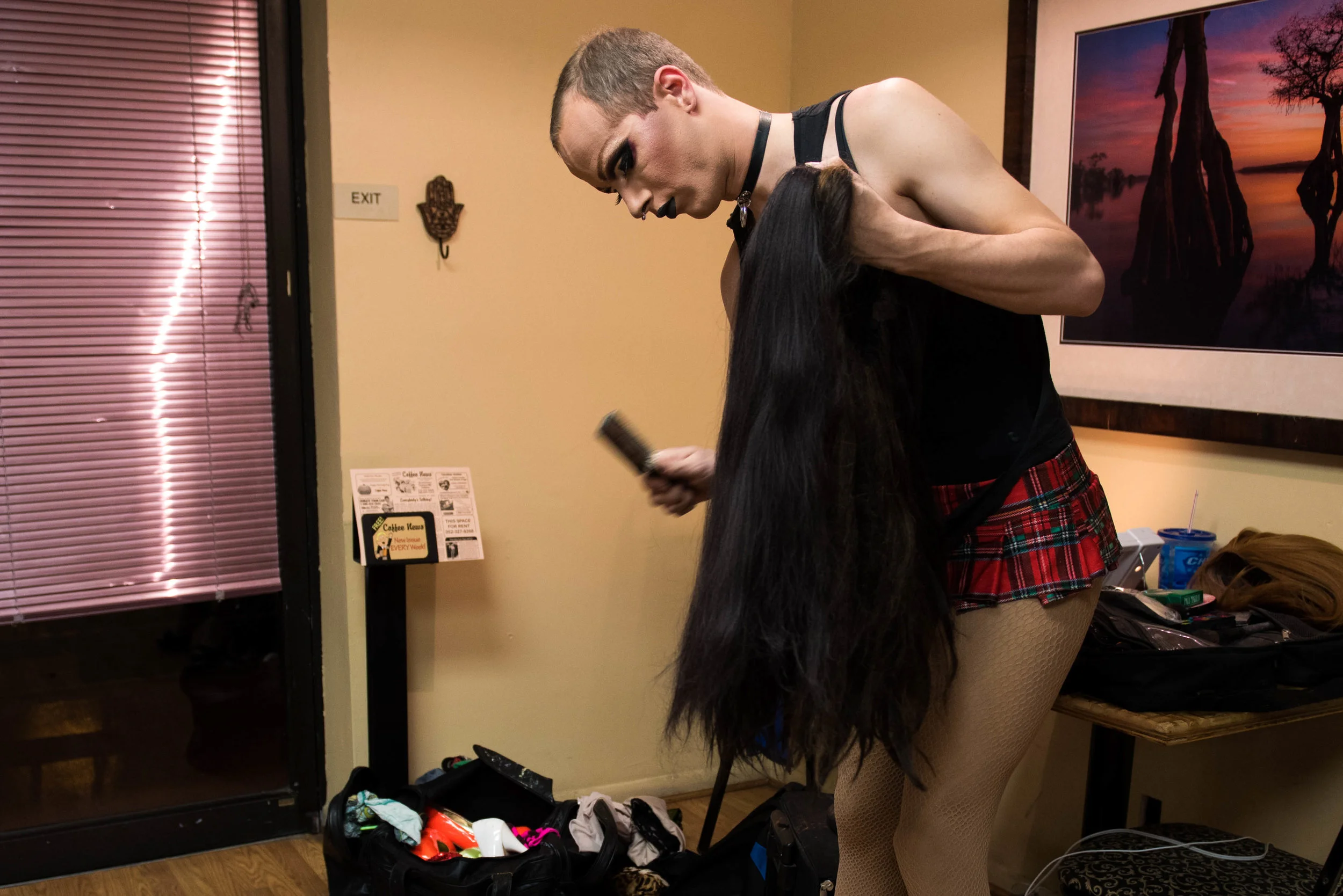 Koedam brushes out the knots in his black wig a few minutes before his performance. He said Rachel comes more alive with each step — so he puts time and care into the details. “I love when someone looks at me as Rachel and doesn’t believe I’m a boy,” Koedam said.