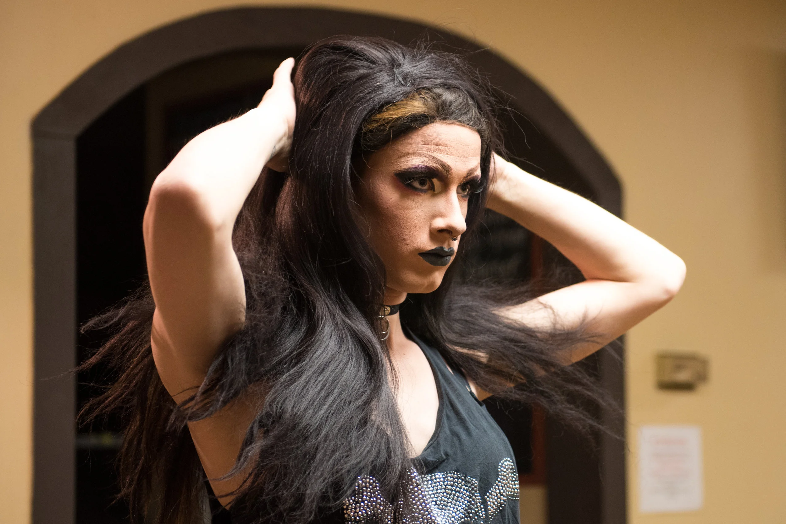 A few minutes before taking the stage, Koedam adjusts his wig and stares into the mirror. He said this moment — the "in between stage” — is one of the most exciting parts of the process. It’s when he begins to feel fully like Rachel.