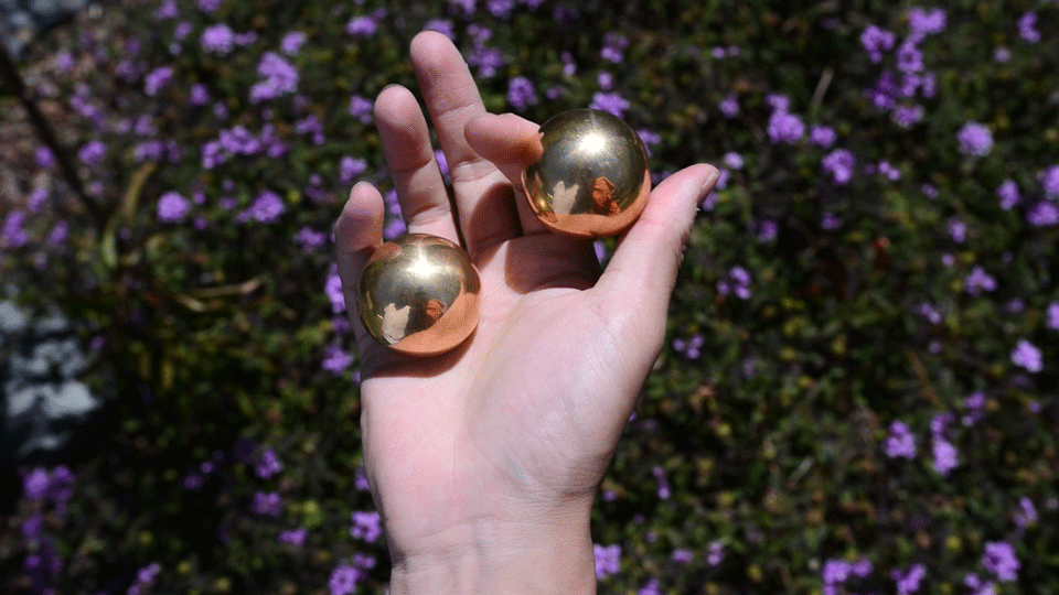 As you progress, try rotating the spheres without touching. This is where you truly find balance.