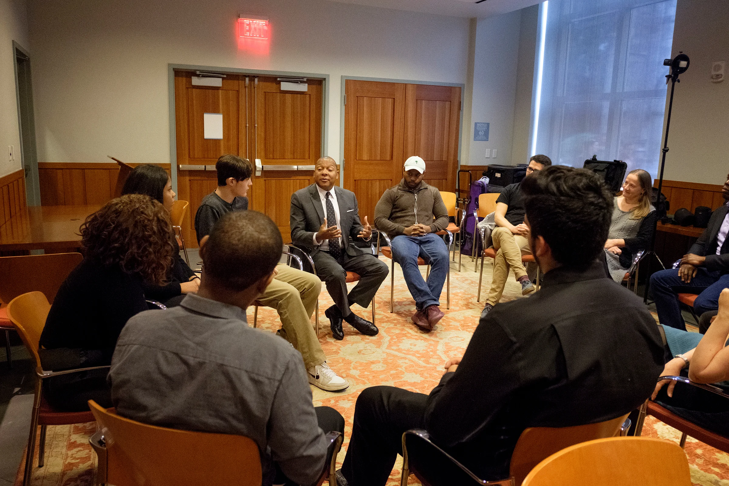 Wynton speaking with students circle.jpg