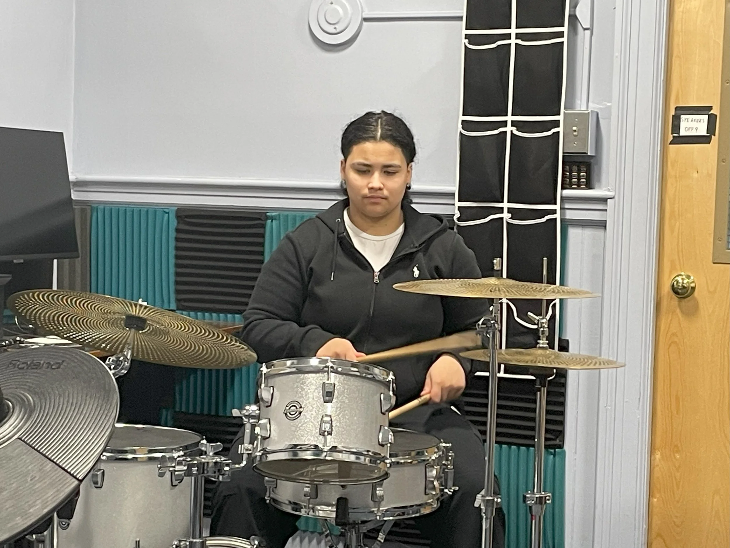 Soukie playing drum 4.jpg