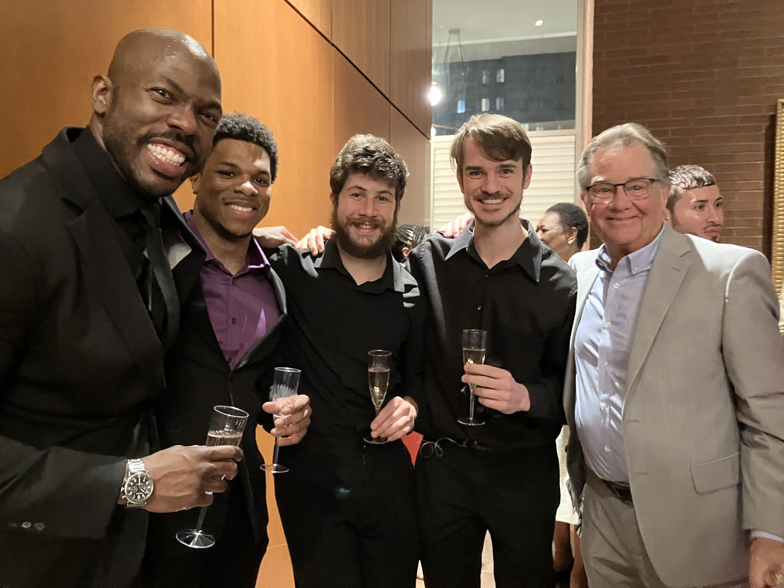 Joe Conyers with members of the Bass Section.jpeg