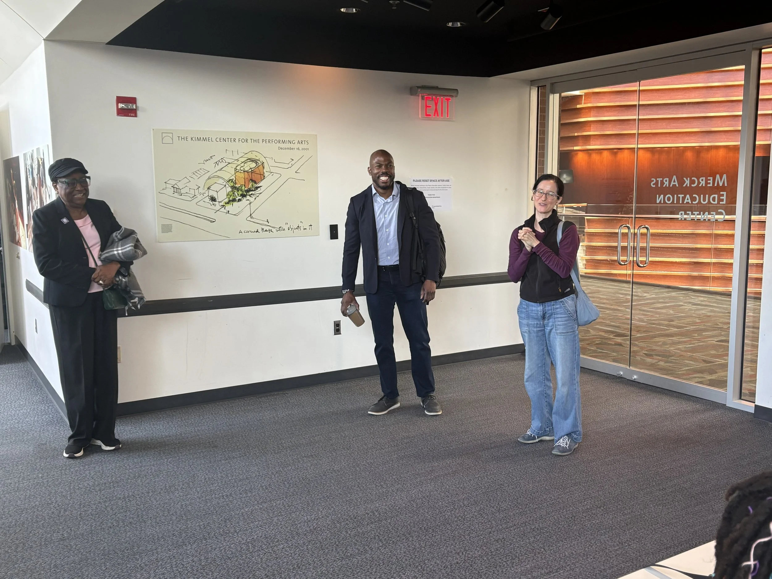 Joe and Yumi talk with students.jpg