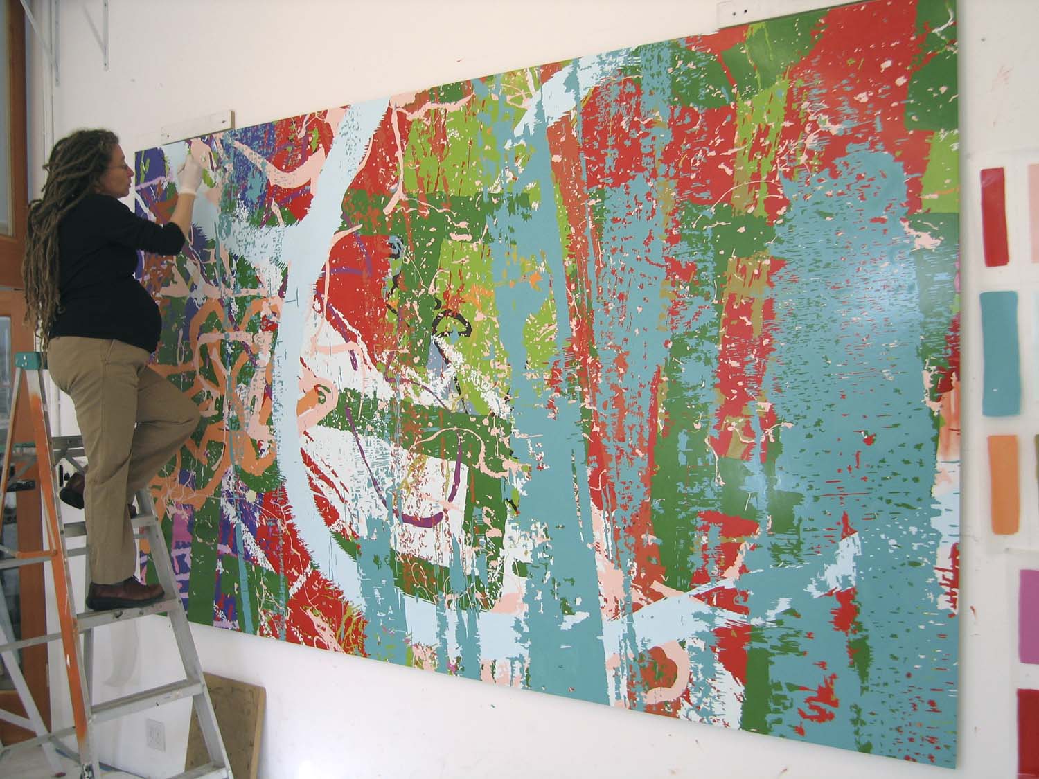 Calame painting while pregnant, 2007