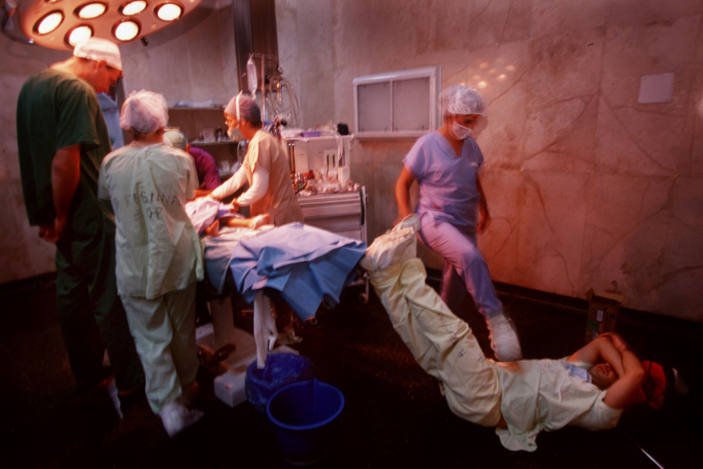 An international team of more than 30 medical specialists-surgeons, anesthesiologists, pediatricians, nurses, and support people, along with three dozen local volunteers worked around the clock at this rudimentary hospital in Santiago del Estero, one of the poorest regions in Argentina. They came to this remote area to repair cleft disfigurements, a prenatal deformity affecting the mouth and nose. ©Gail Fisher for Los Angeles Times 