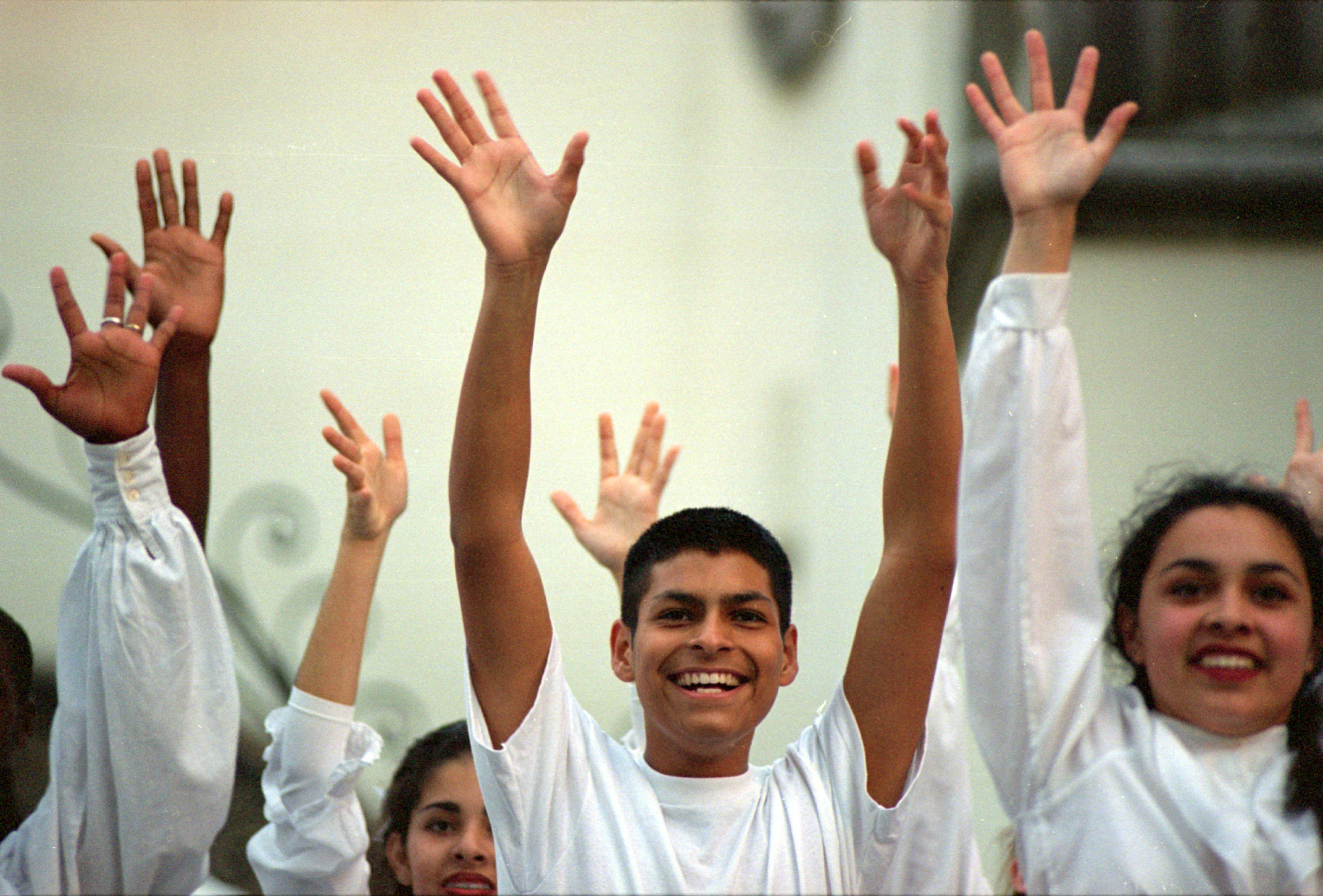 During a dress rehearsal before a performance, students react to their teacher, Beth Burn’s comments. “ There are a lot of people in the world who didn't spend today making the world a better place." She continues, "You guys did, and that's way cool, but when you perform today, you have to let these other people feel that. You have to show them in your dancing." ©Gail Fisher Los Angeles Times 