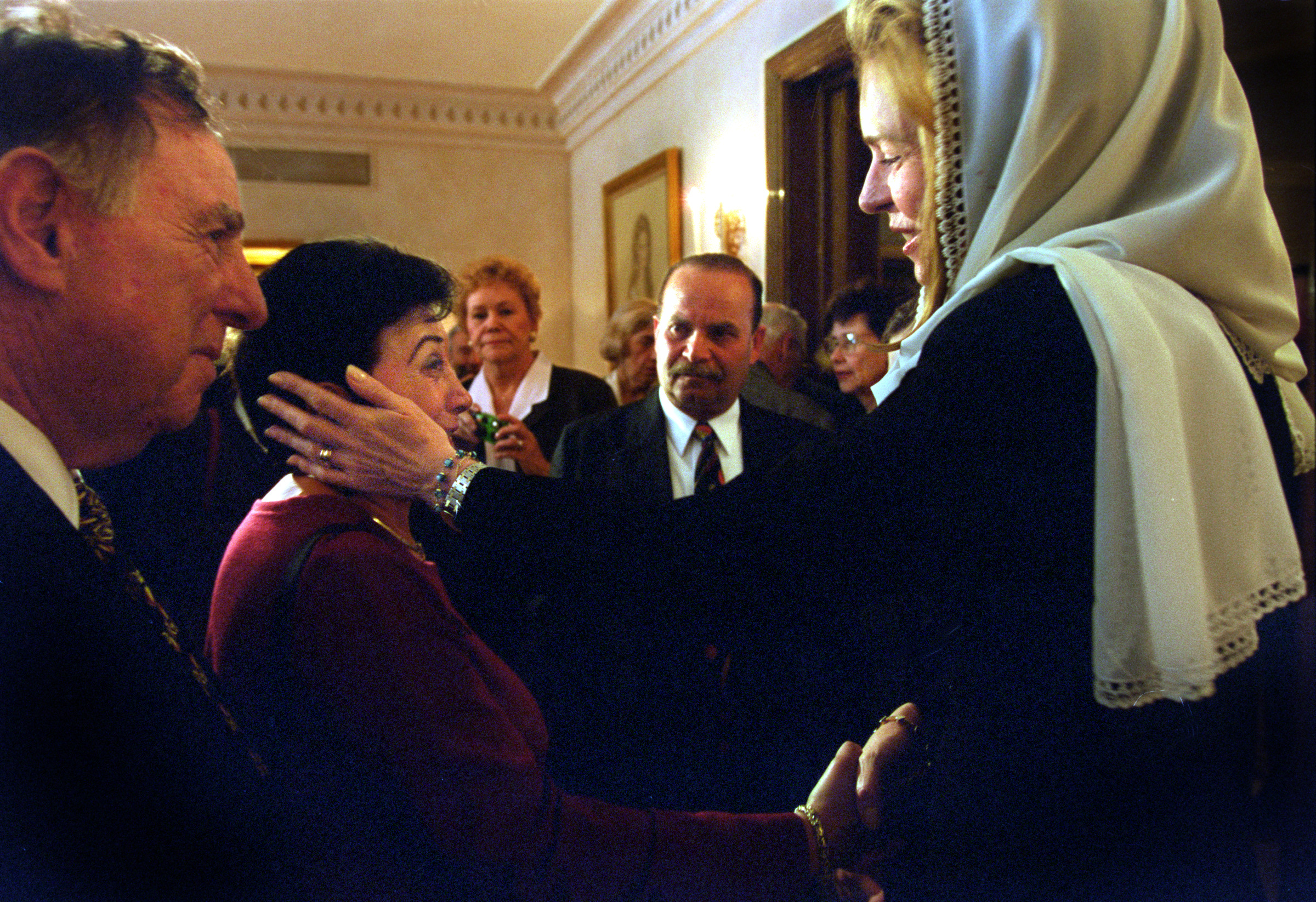 Left, Martin Klein and his wife Florence are greeted by Queen Noor in the royal palace in Amman Jordan. The Interfaith group experienced many religious and cultural encounters during their travels throughout Israel and the Kingdom of Jordan. ©Gail Fisher Los Angeles Times
