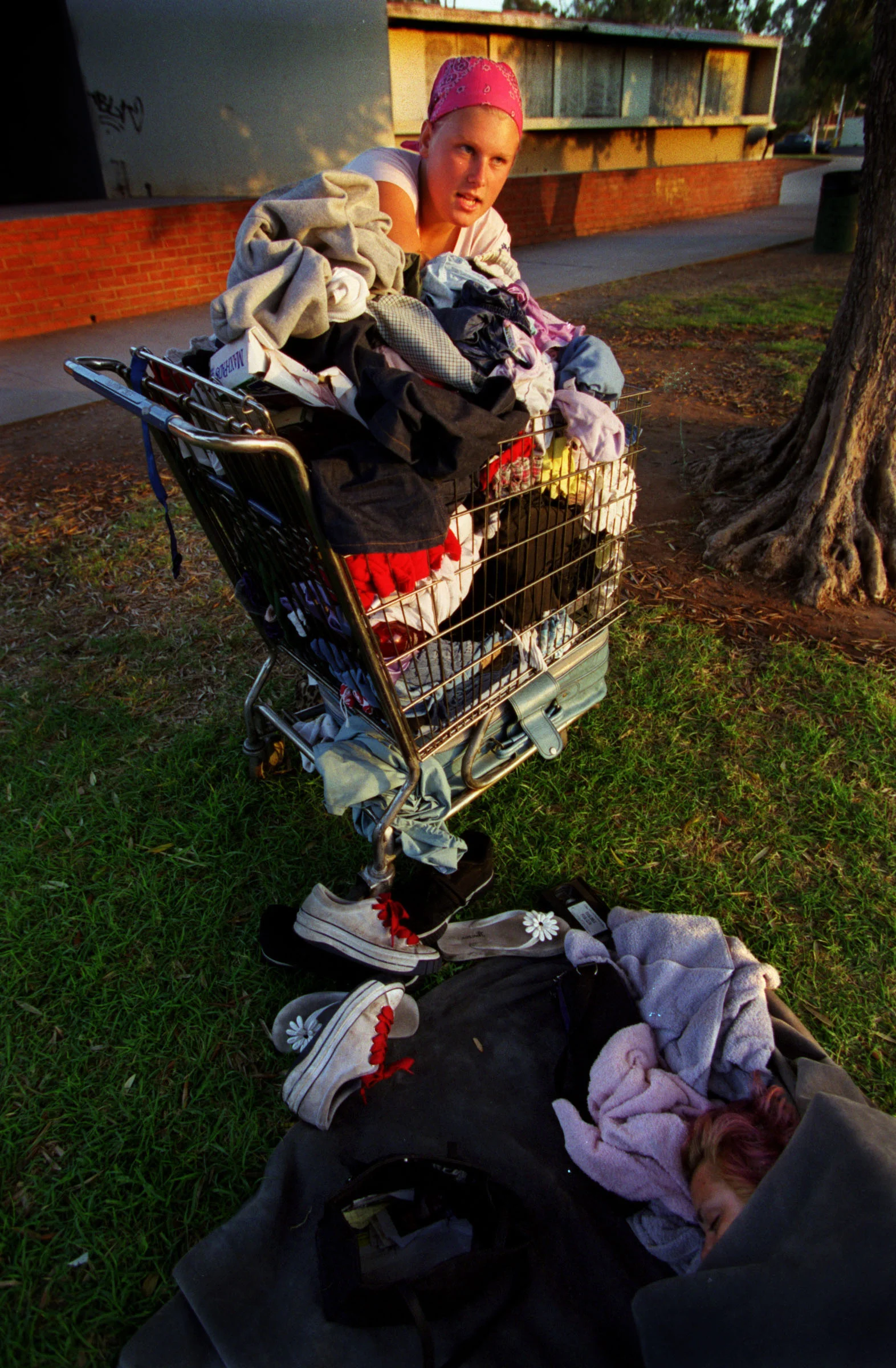 "I have nothing but the clothes that I own. That's about it, that's all I own is a cart with my clothes in it and like a couple of pictures and that's about it... But what can I do? It's just a big mess, " says Janea. ©Gail Fisher Los Angeles Times 