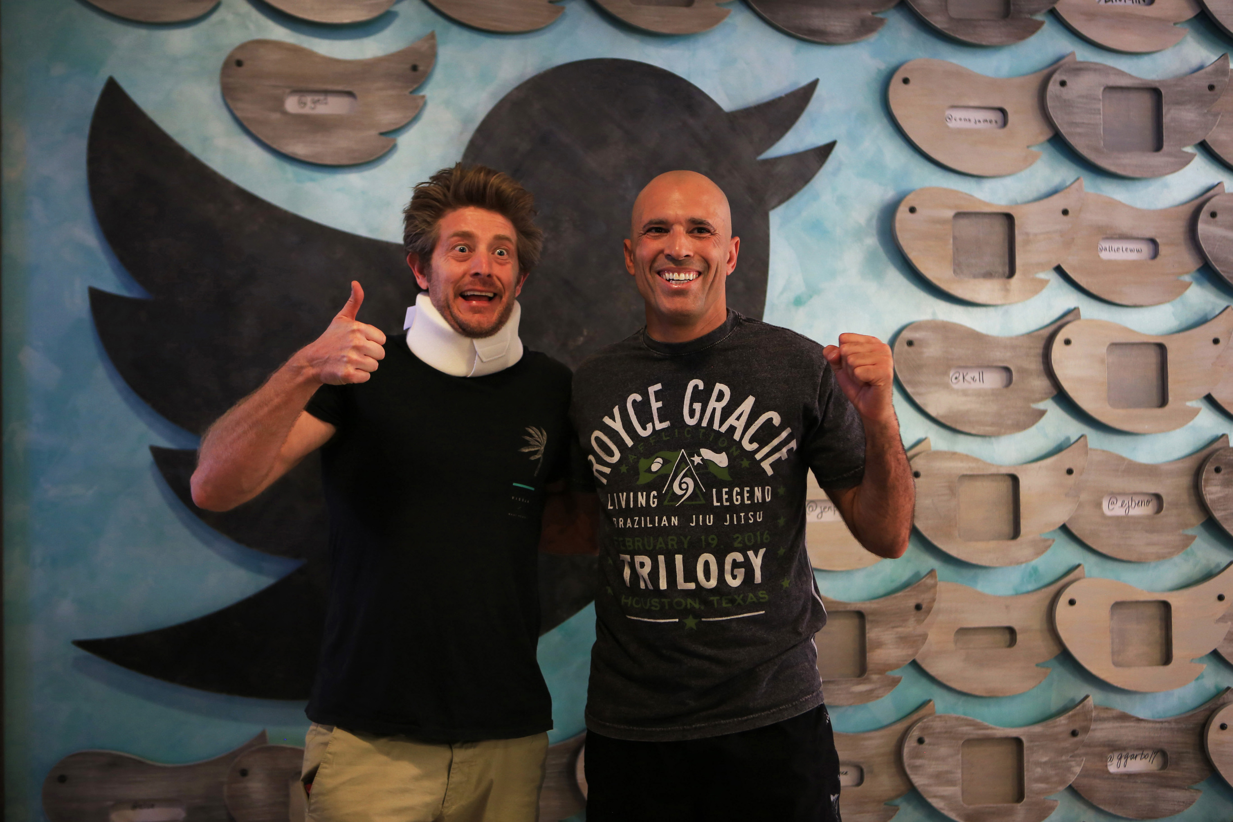  Jason Nash, left, internet filmmaker, writer and Vine phenomenon, stands with Gracie, right, mixed martial artist for Bellator MMA at Twitter, during their iPhone video shoot at Twitter in Santa Monica, CA. (©Gail Fisher for ESPN) 