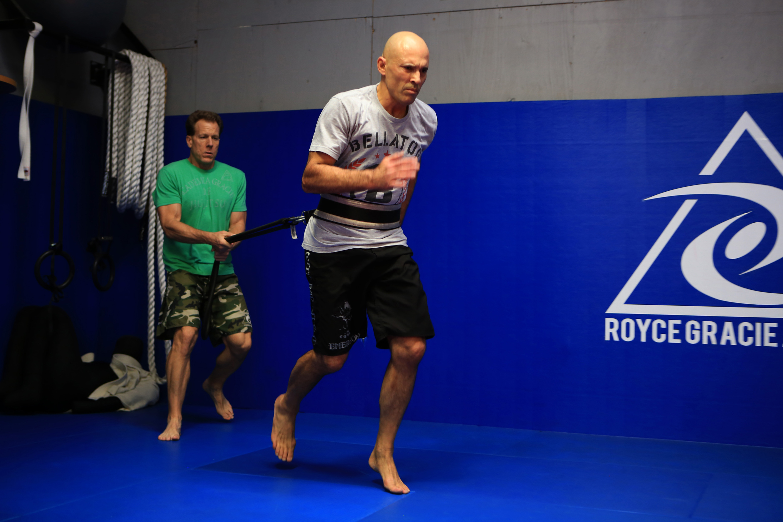  Gracie, right, UFC legend, trains with Strom, left, former strength and conditioning coach for the USC Trojans and LA Rams, during a strenuous workout at the Royce Gracie Jiu-Jitsu Academy in Torrance, California. (©Gail Fisher for ESPN) 