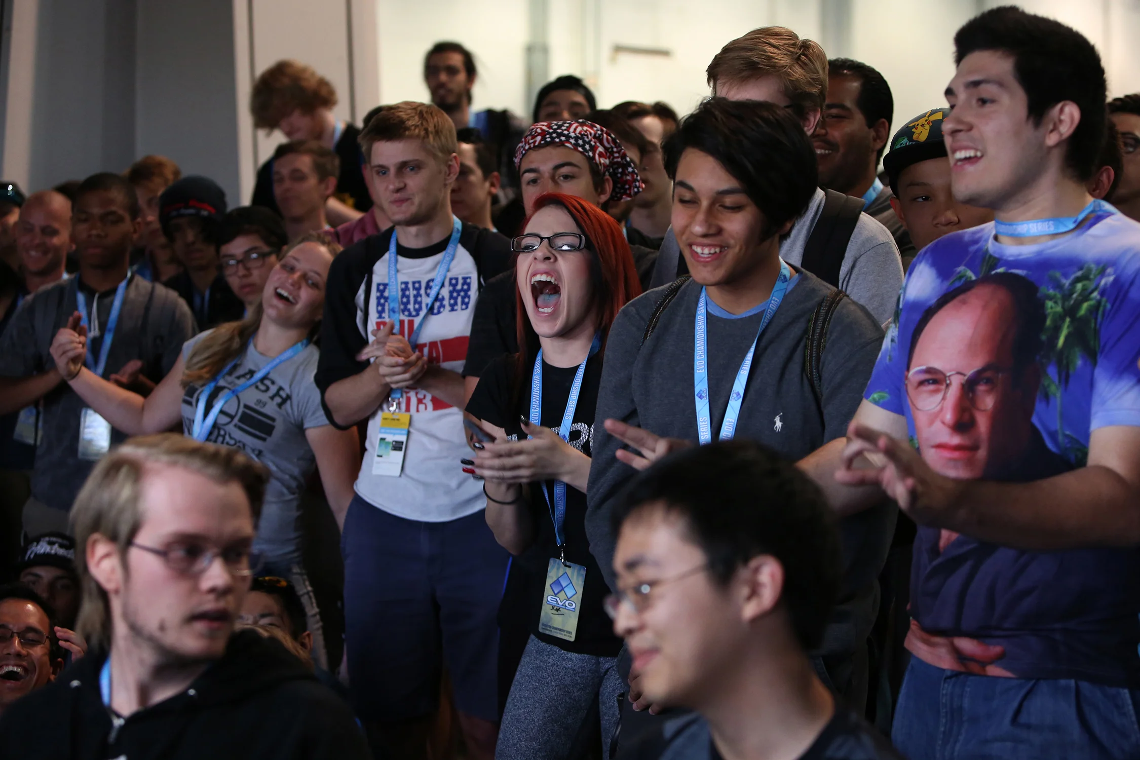 The fans cheer Adam “Aramada” Lindgren, left, as he wins the Smash Bros. Melee tournament and advances to the finals. © Gail Fisher for ESPN