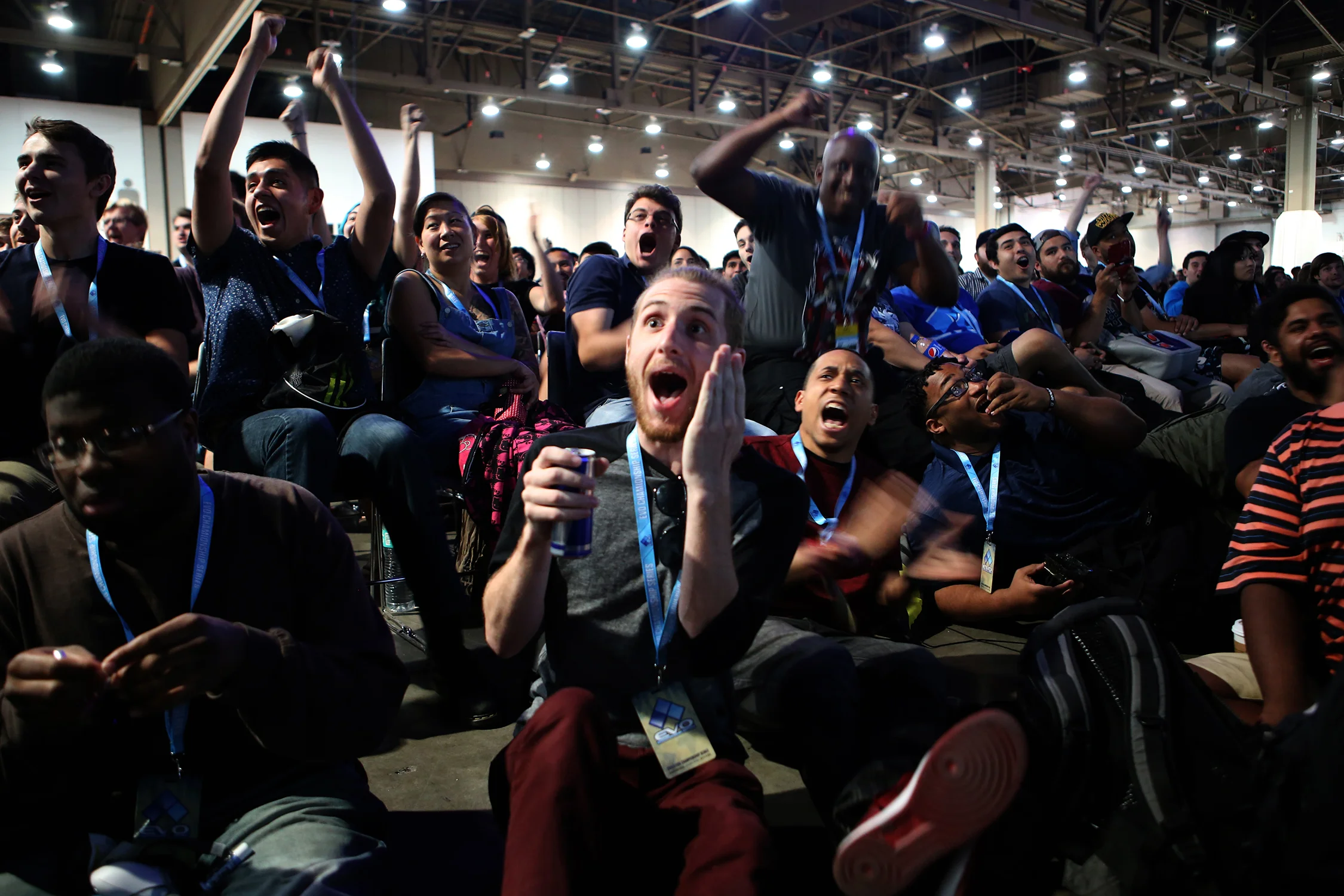 Fans jump out of their seats during the Smash Bros. for a Wii U winner’s bracket semifinals match. © Gail Fisher for ESPN