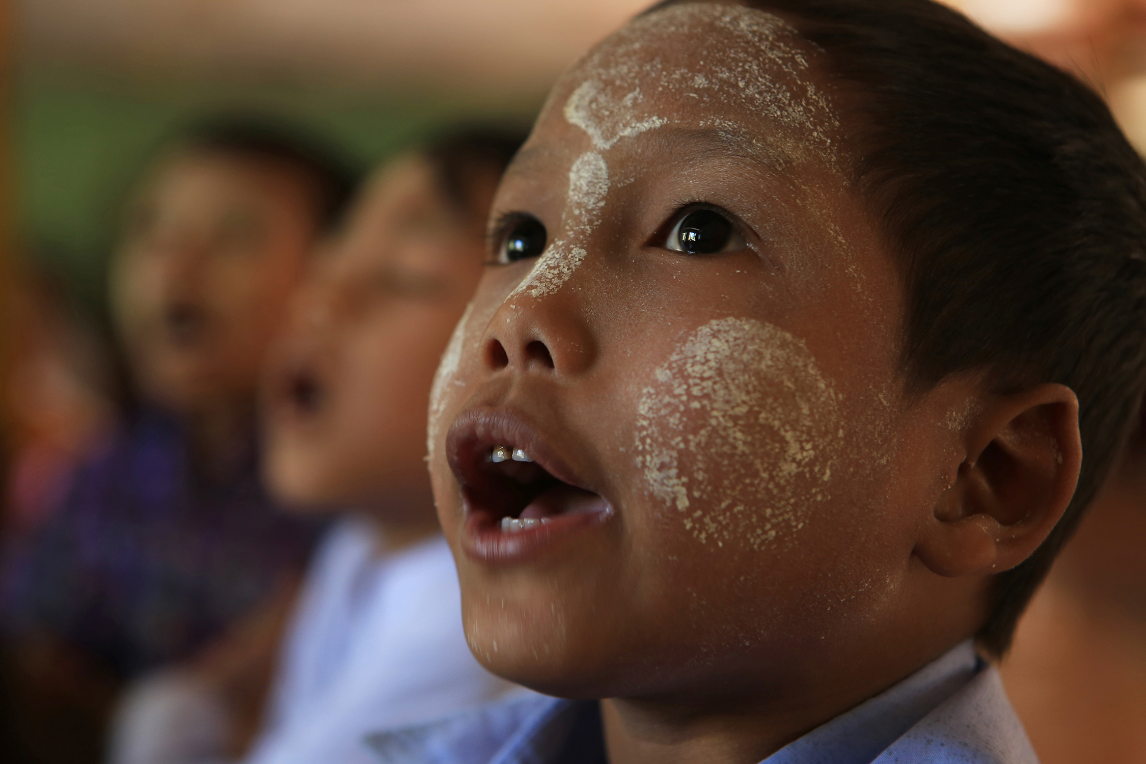  Children at the Ma Soe Yein Monastery wear thanaka,&nbsp; a natural sunscreen made from the bark of a tree. © Gail Fisher for Los Angeles Times 