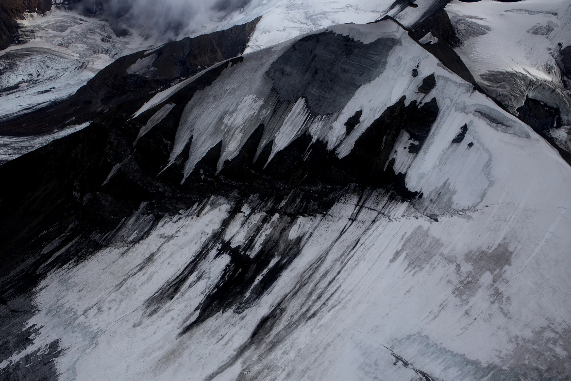 Moraines are created as debris accumulates that ride along the edge of the moving glaciers. © Photo by Gail Fisher