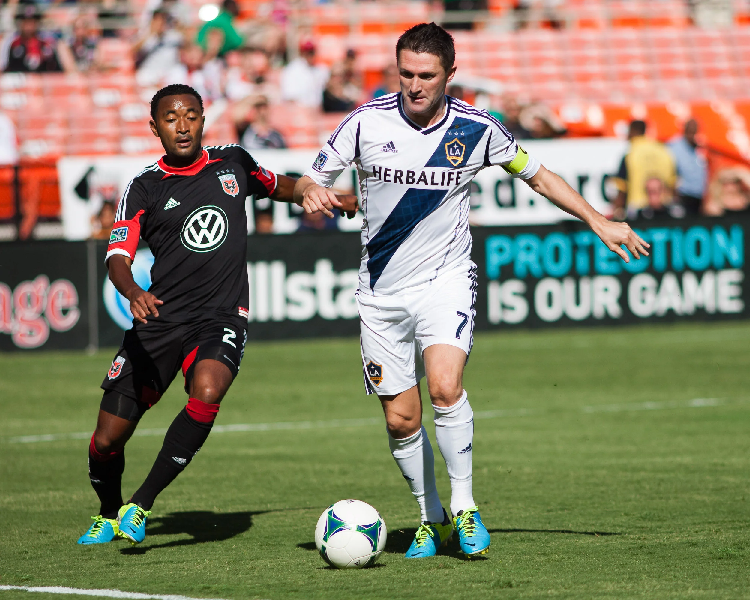 Robbie Keane (7) & James Riley