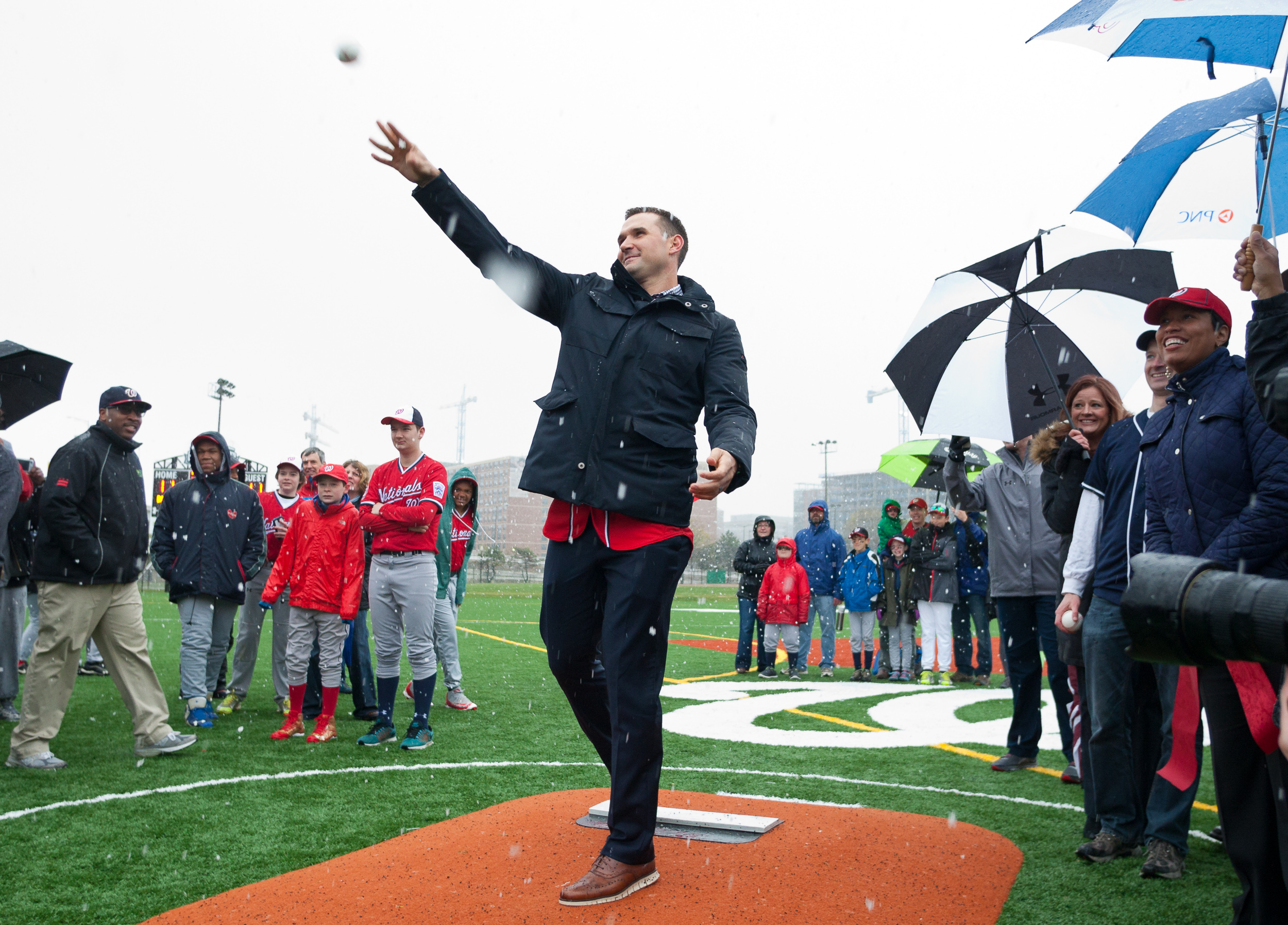  Washington Nationals first baseman Ryan Zimmerman throws out a ceremonial pitch during the dedication of Ryan Zimmerman Field in Washington, D.C., April 9, 2016. 