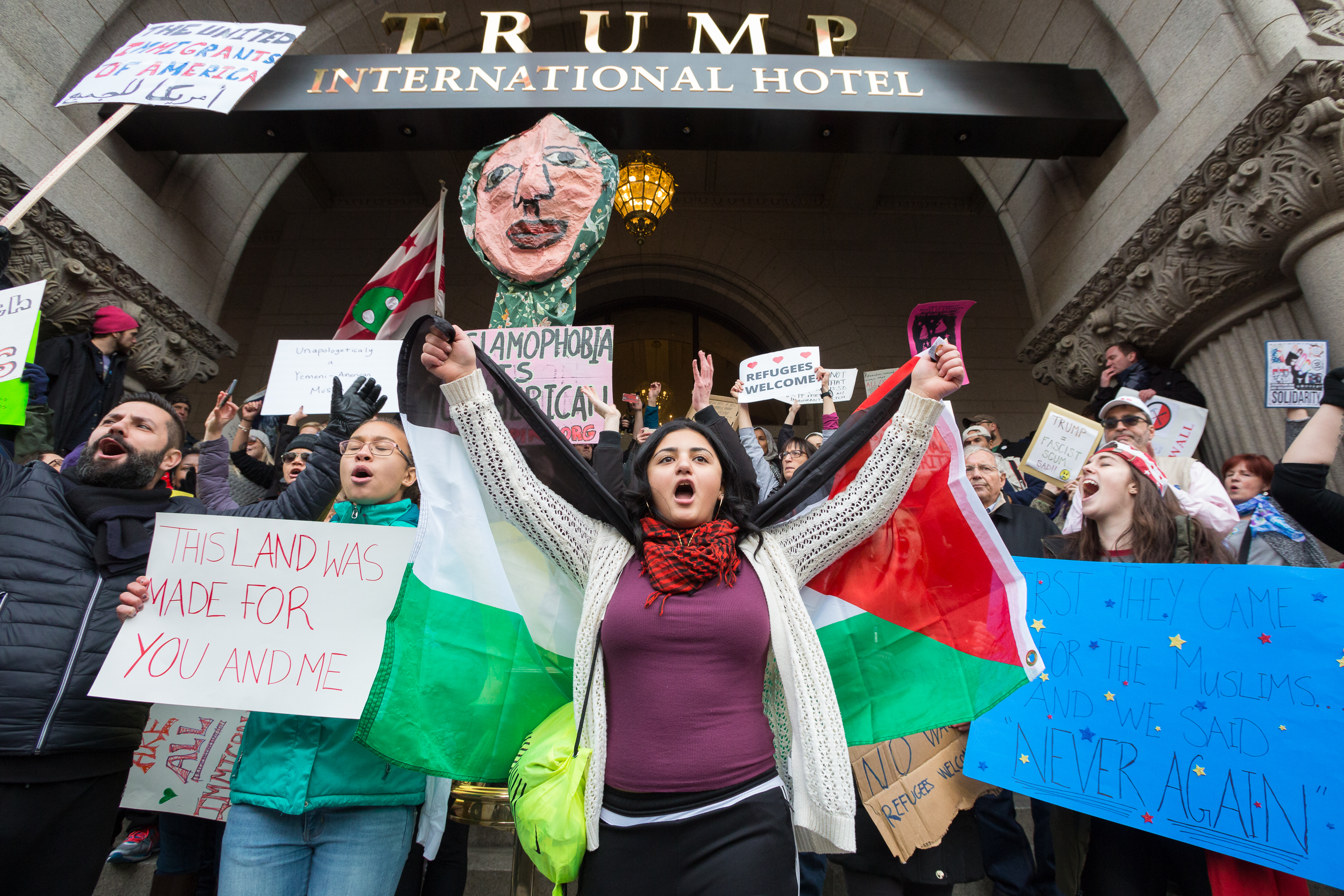  Protesters demonstrate at the Trump International Hotel in Washington, DC., Jan. 29, 2017. 