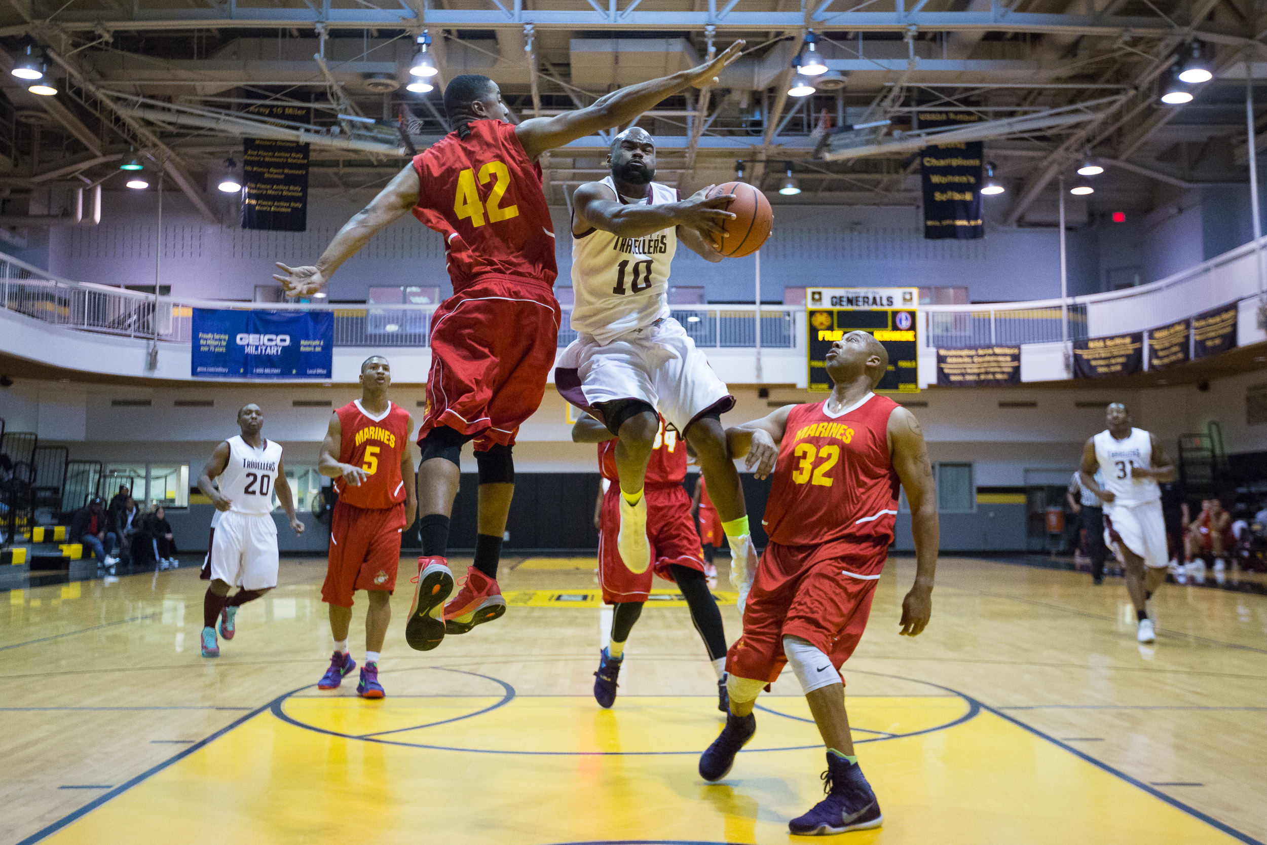  The Ft. Lee Travellers take on the NCR Marines Operation Santa Basketball Tournament at Joint Base Myer-Henderson Hall Dec. 11, 2016.&nbsp; 