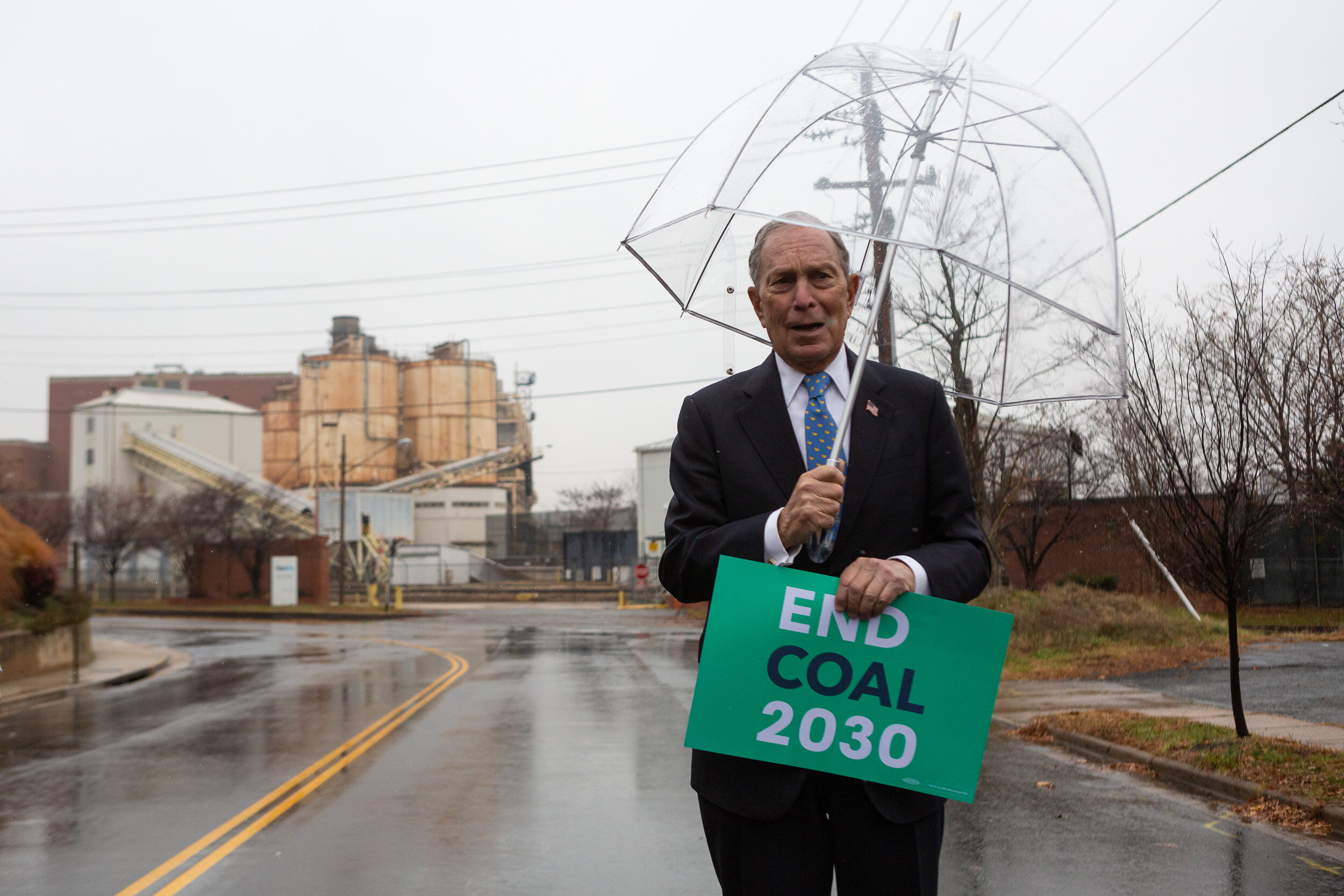  Democratic presidential candidate Michael Bloomberg poses near a defunct coal plant during a campaign event in Alexandria, Va., Dec. 13, 2019. 