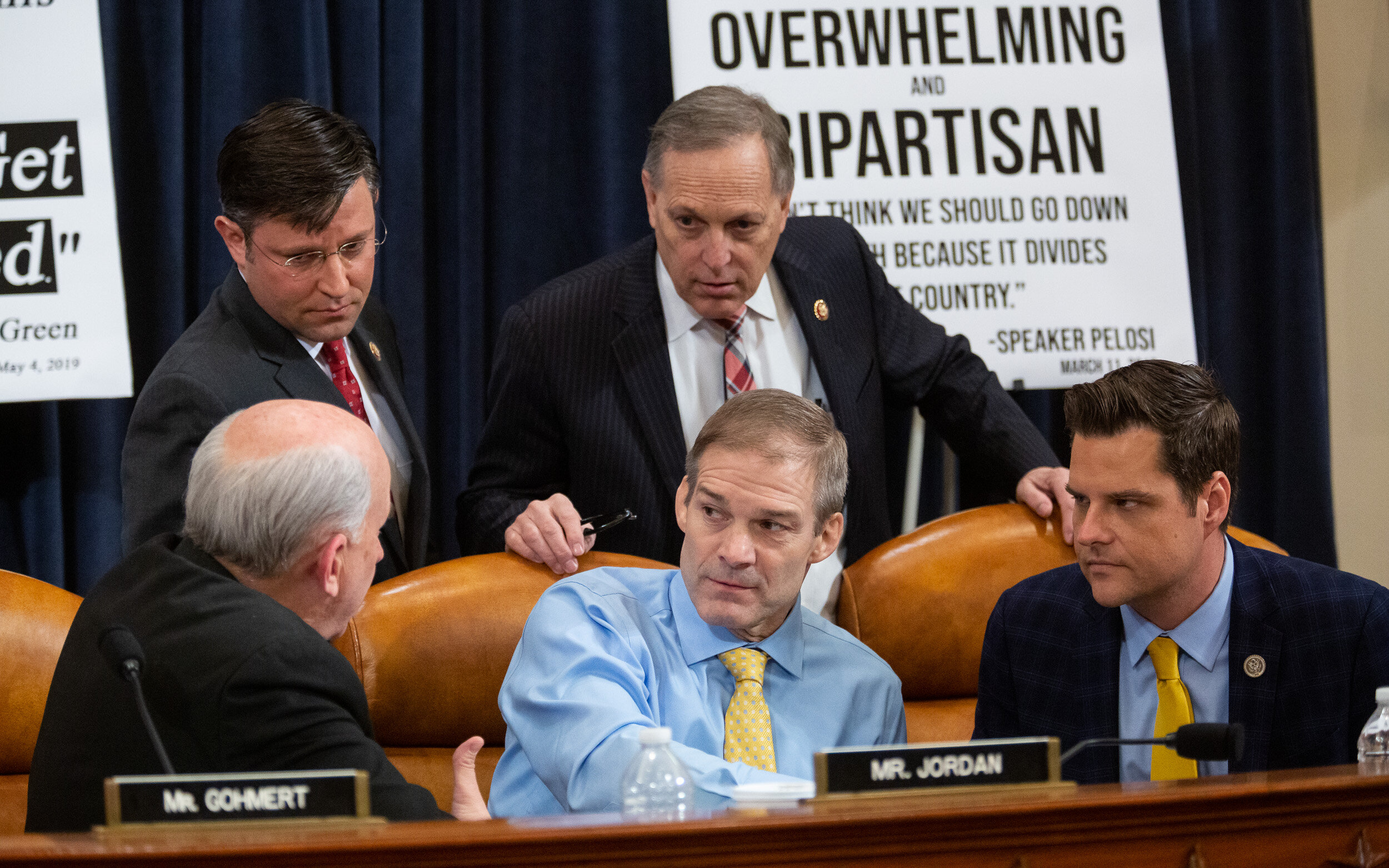  Republican members of the House Judiciary Committee converse during a hearing on the impeachment inquiry into President Trump Dec. 4, 2019. 