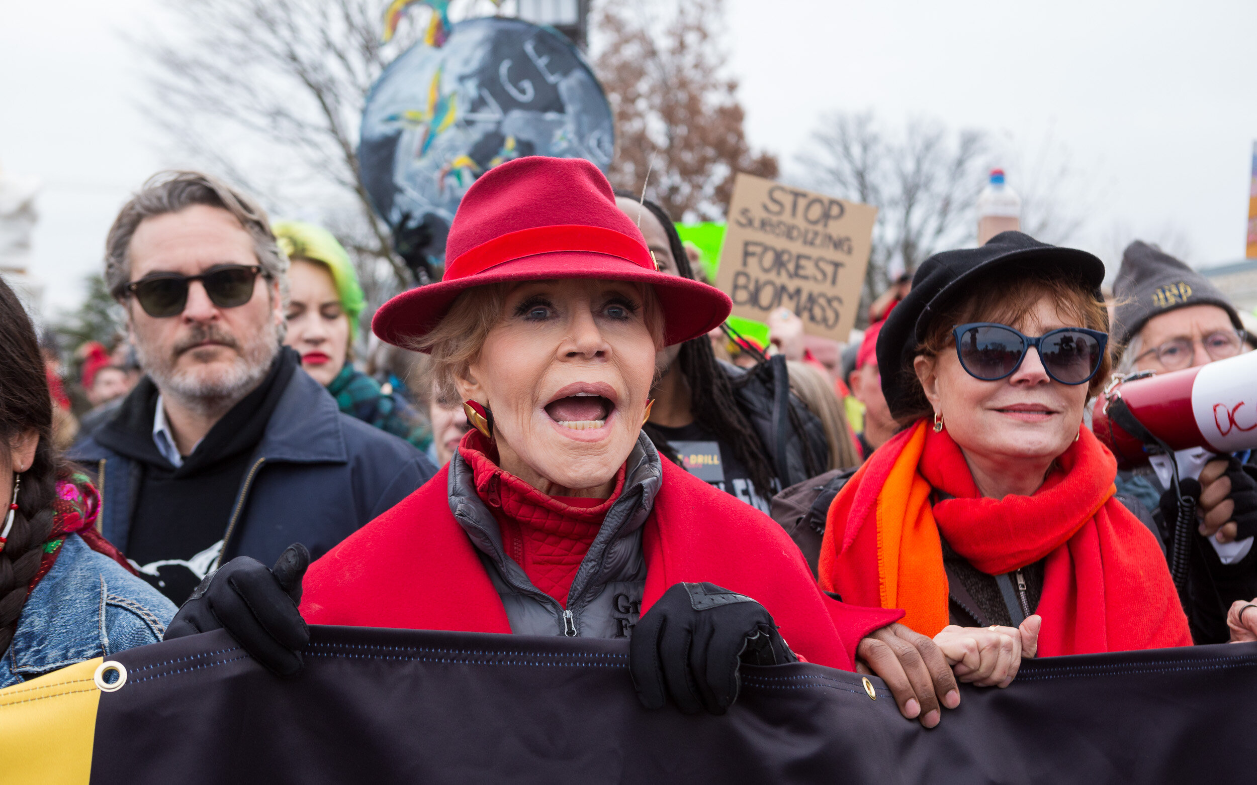 Jane Fonda, flanked by fellow actors Joachin Phoenix and Susan Sarandon, leads her 14th and final Fire Drill Fridays climate protest at the U.S. Capitol Jan. 10, 2020.