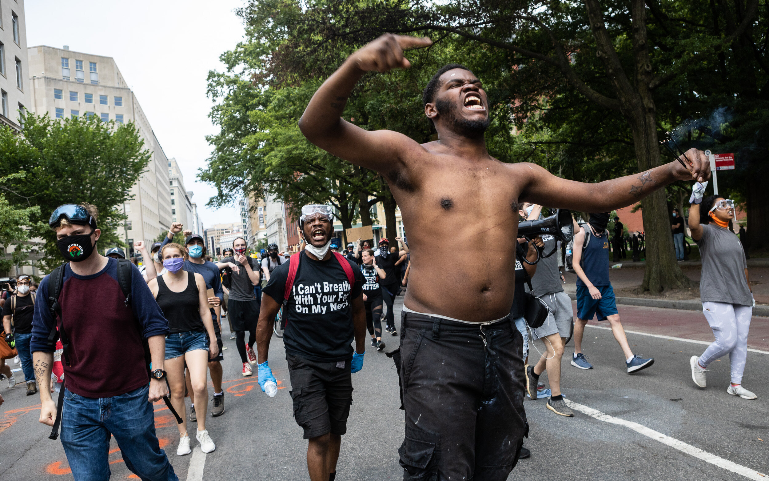  Protesters march into Black Lives Matter Plaza near the White House June 22, 2020. 