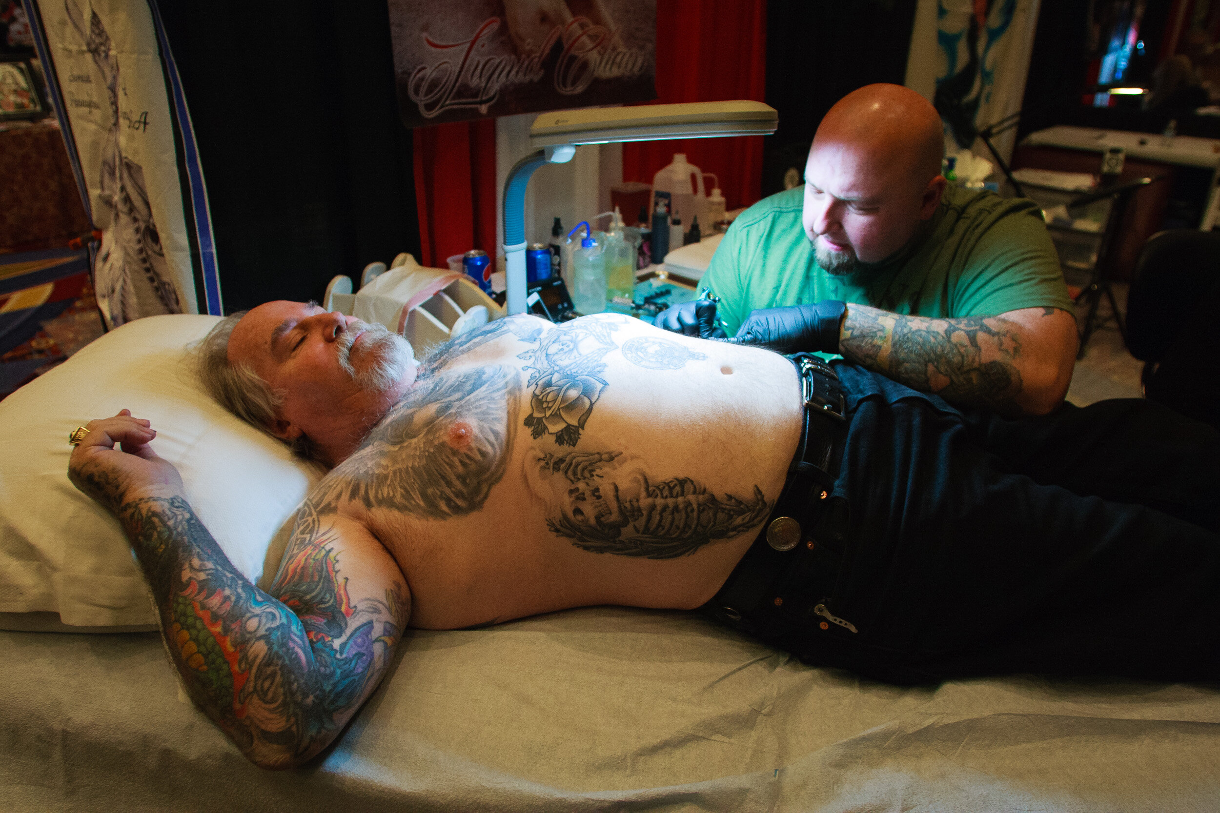  A man gets tattooed at the D.C. Tattoo Expo at the Crystal Gateway Marriott in Arlington, Va., Jan. 17, 2015. 