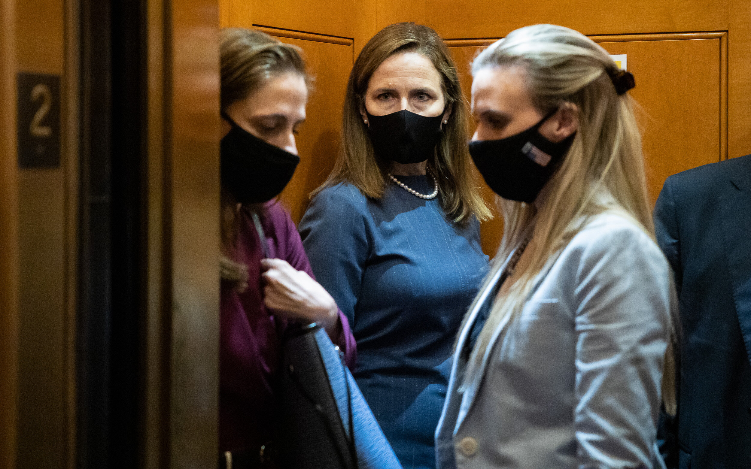  Supreme Court nominee Amy Coney Barrett boards an elevator at the U.S. Capitol after meetings with Republican senators Sept. 29, 2020. 