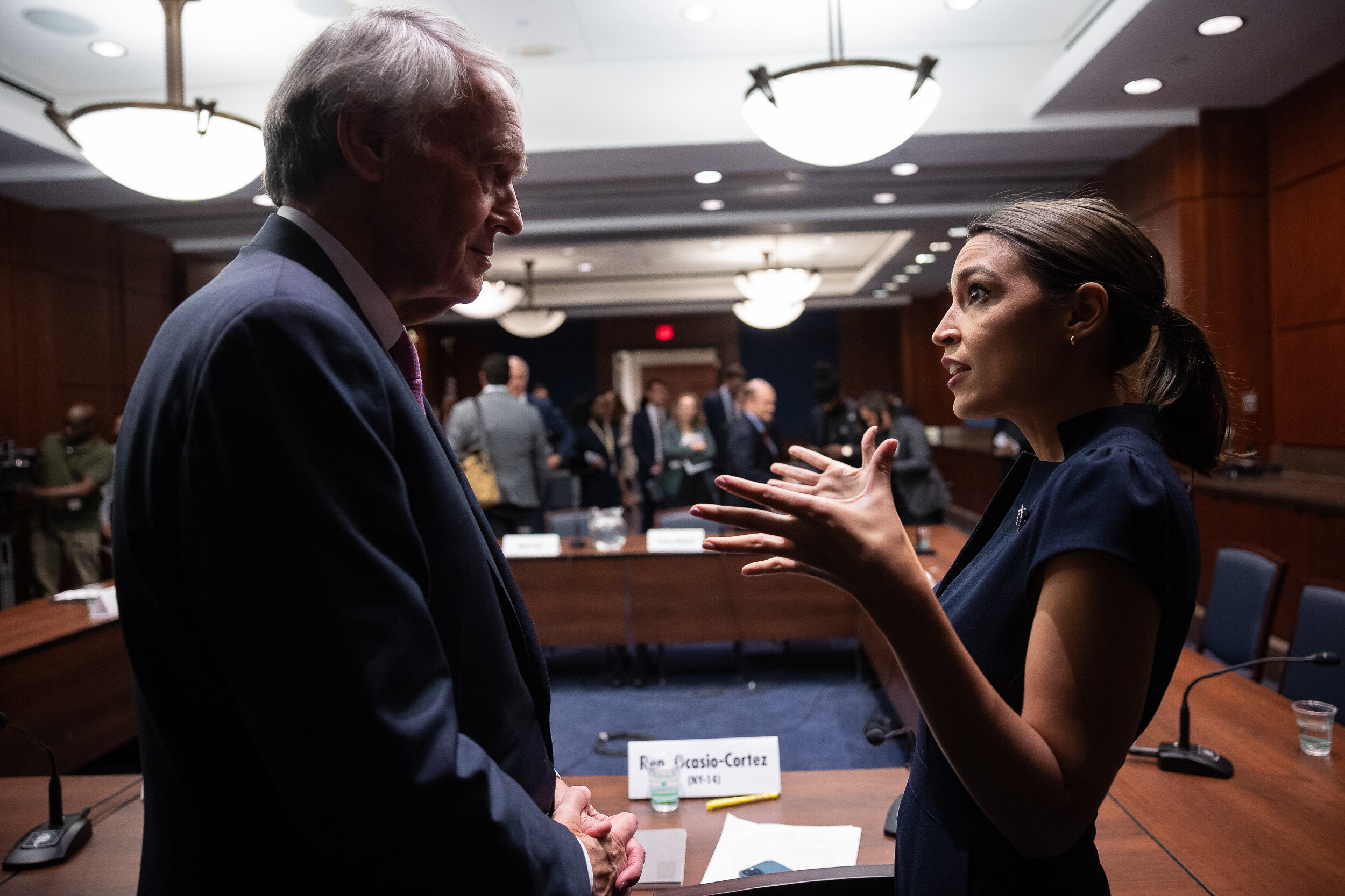  Sen. Ed Markey (D-Mass.) speaks with Rep. Alexandria Ocasio-Cortez (D-N.Y.) on Capitol Hill after a bicameral hearing on the benefits of establishing a Civilian Climate Corps June 23, 2021. 