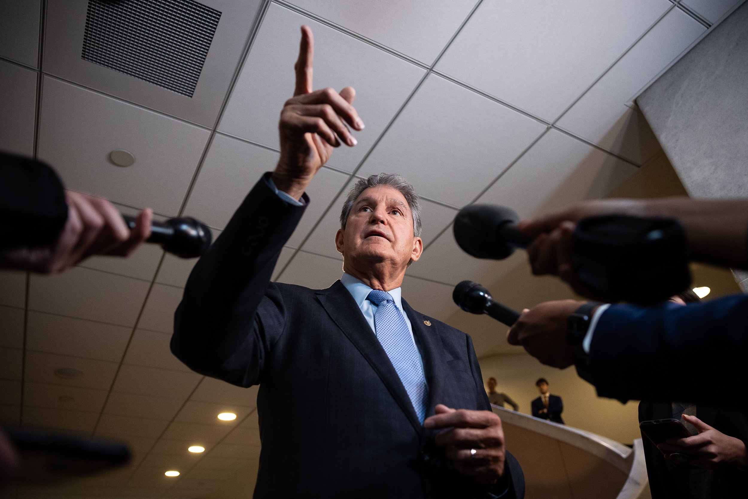  Sen. Joe Manchin (D-W.Va.) speaks with reporters on Capitol Hill Oct. 27, 2021. 