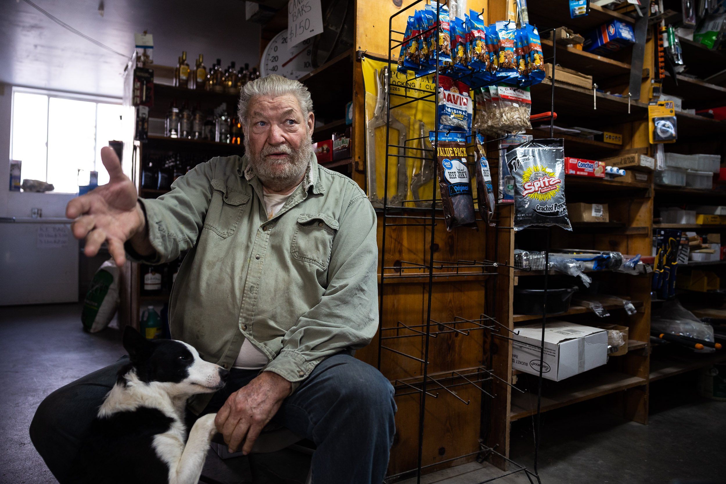  Ted Rookstool, proprietor of the Windspur General Store in Orovada, Nev., with his dog, Little Dog, Dec. 7, 2021. 